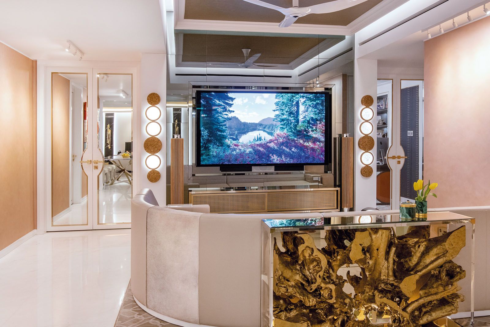 The use of mirrored surfaces visually expands the space