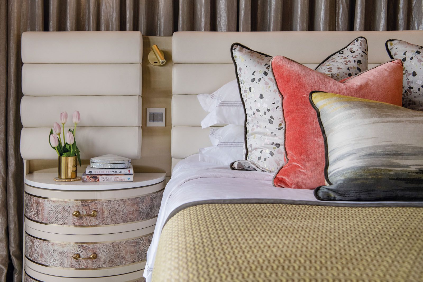 The curved proportions of the furnishings add a cosy touch to the master suite