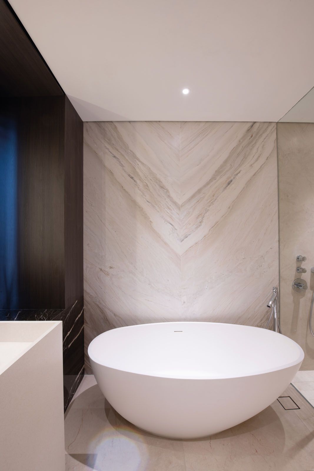 The egg-shaped bathtub is the centrepiece of the master bathroom