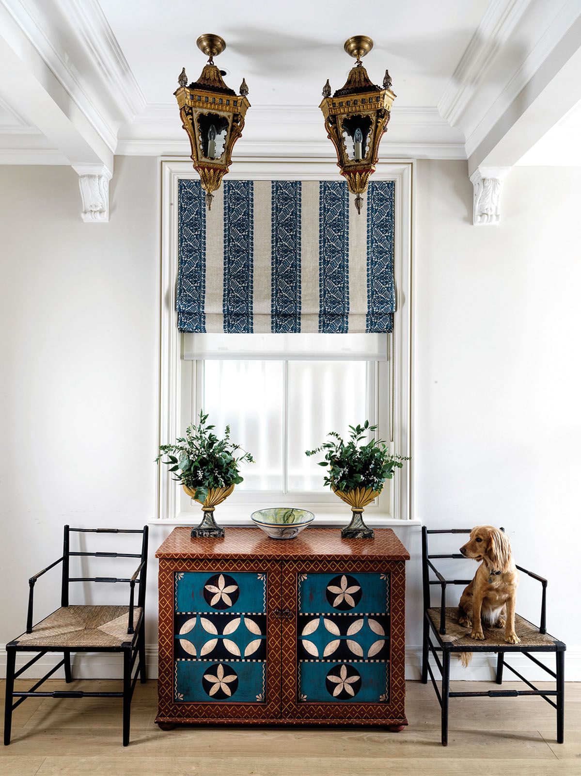 This custom-made shoe cabinet features cues from American folk art
