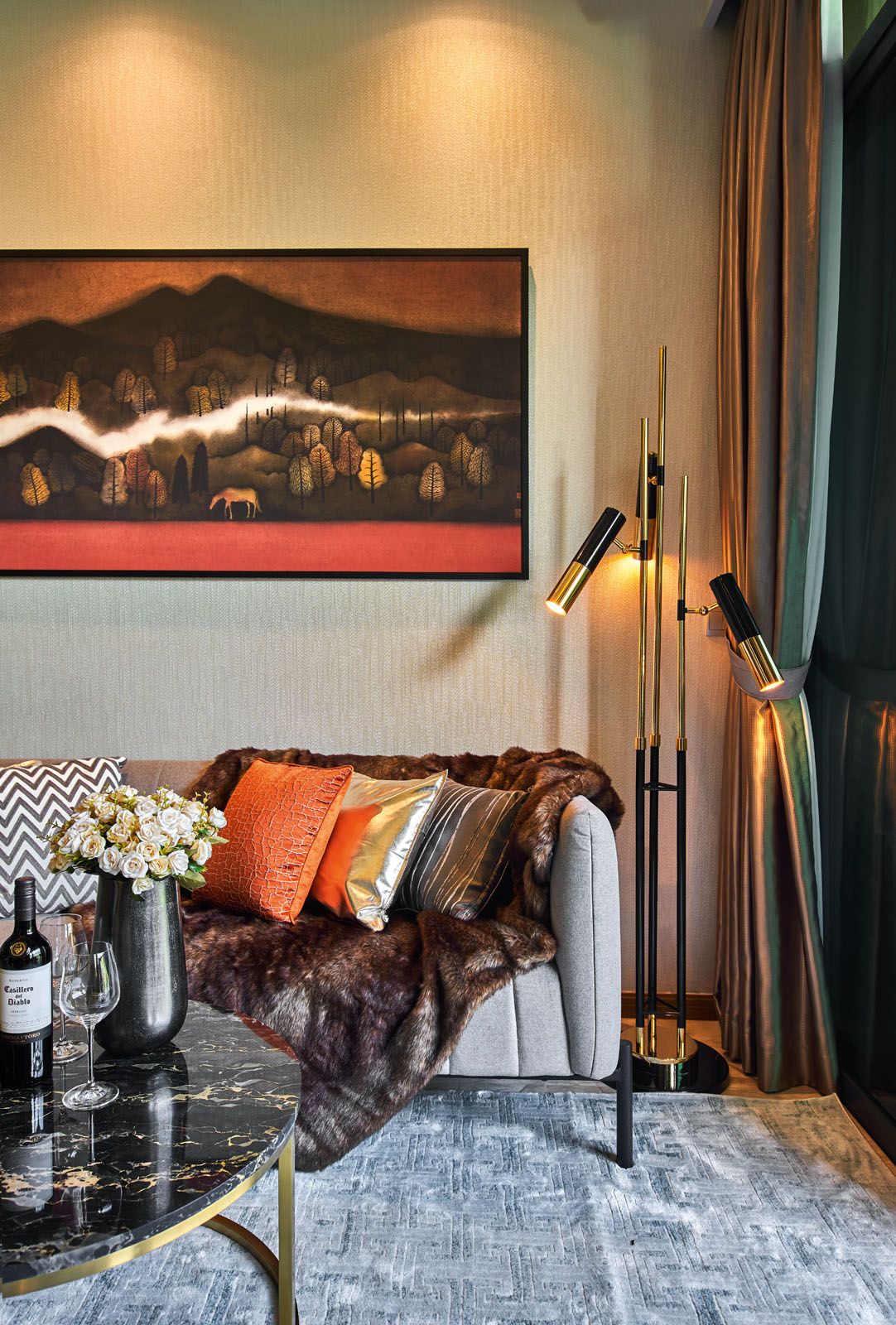 This painting by Chinese artist Huang Hong Tao in the living room perpetuates the botanical theme