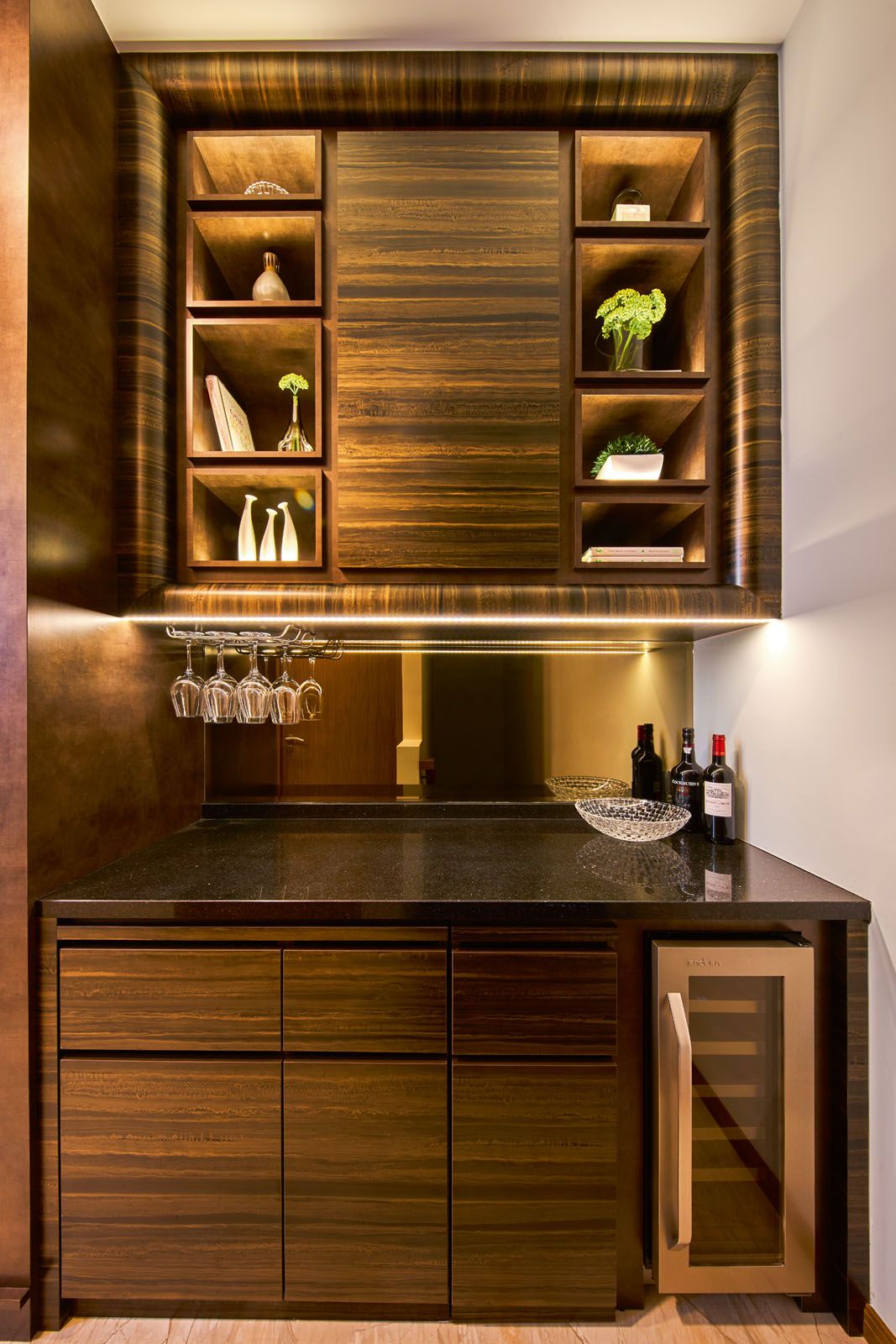 The family room on the second floor features a handsome bar counter