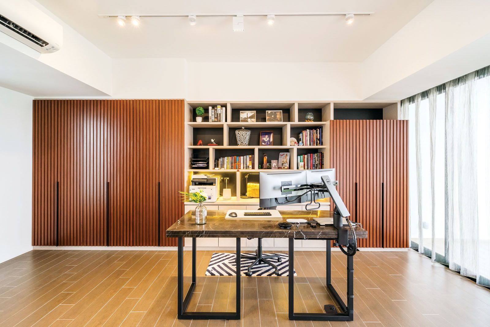 A third storey was added to the home to create a conducive workspace for the couple