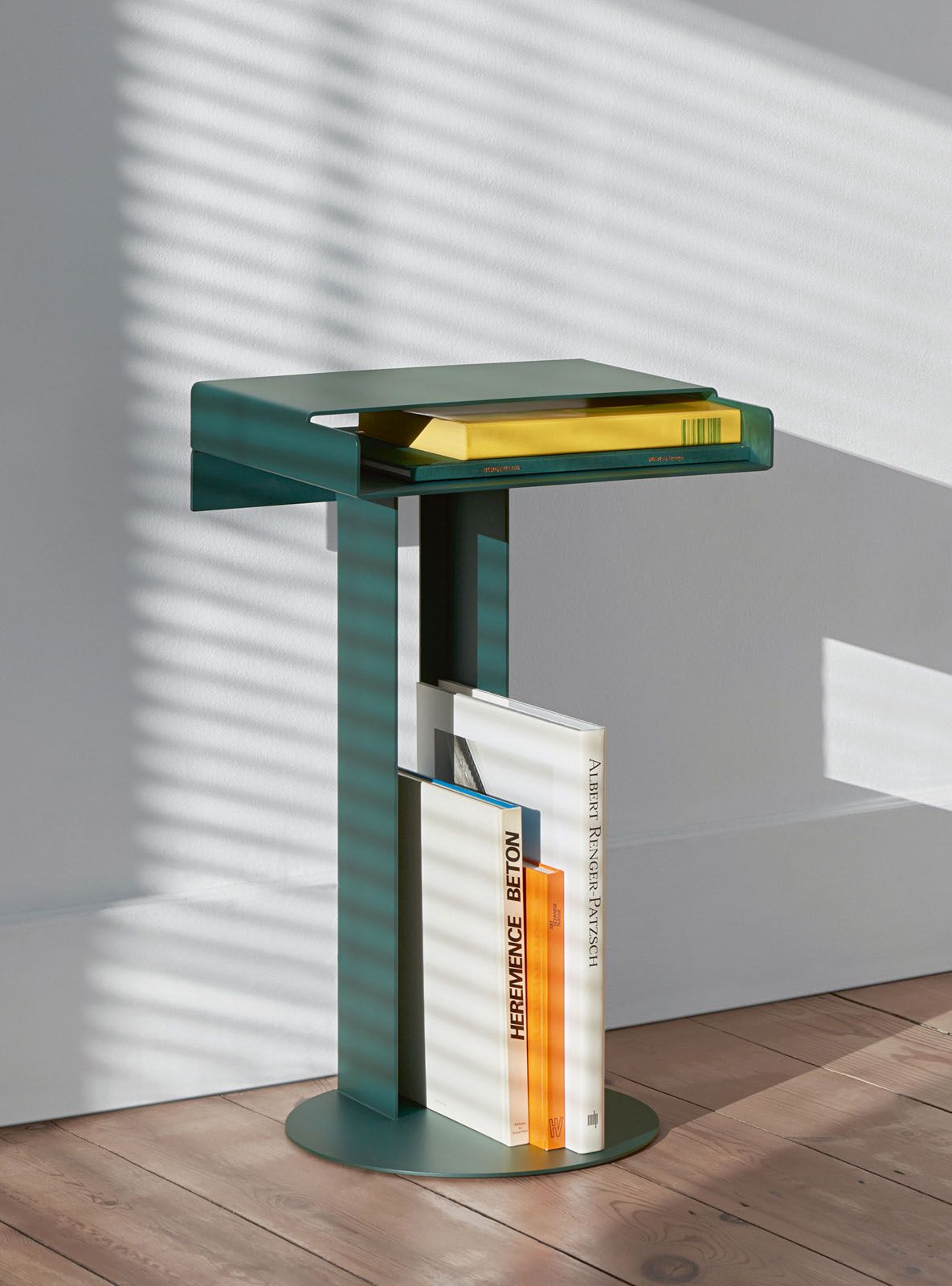 The Meta side table in green from New Tendency is a modern accent piece