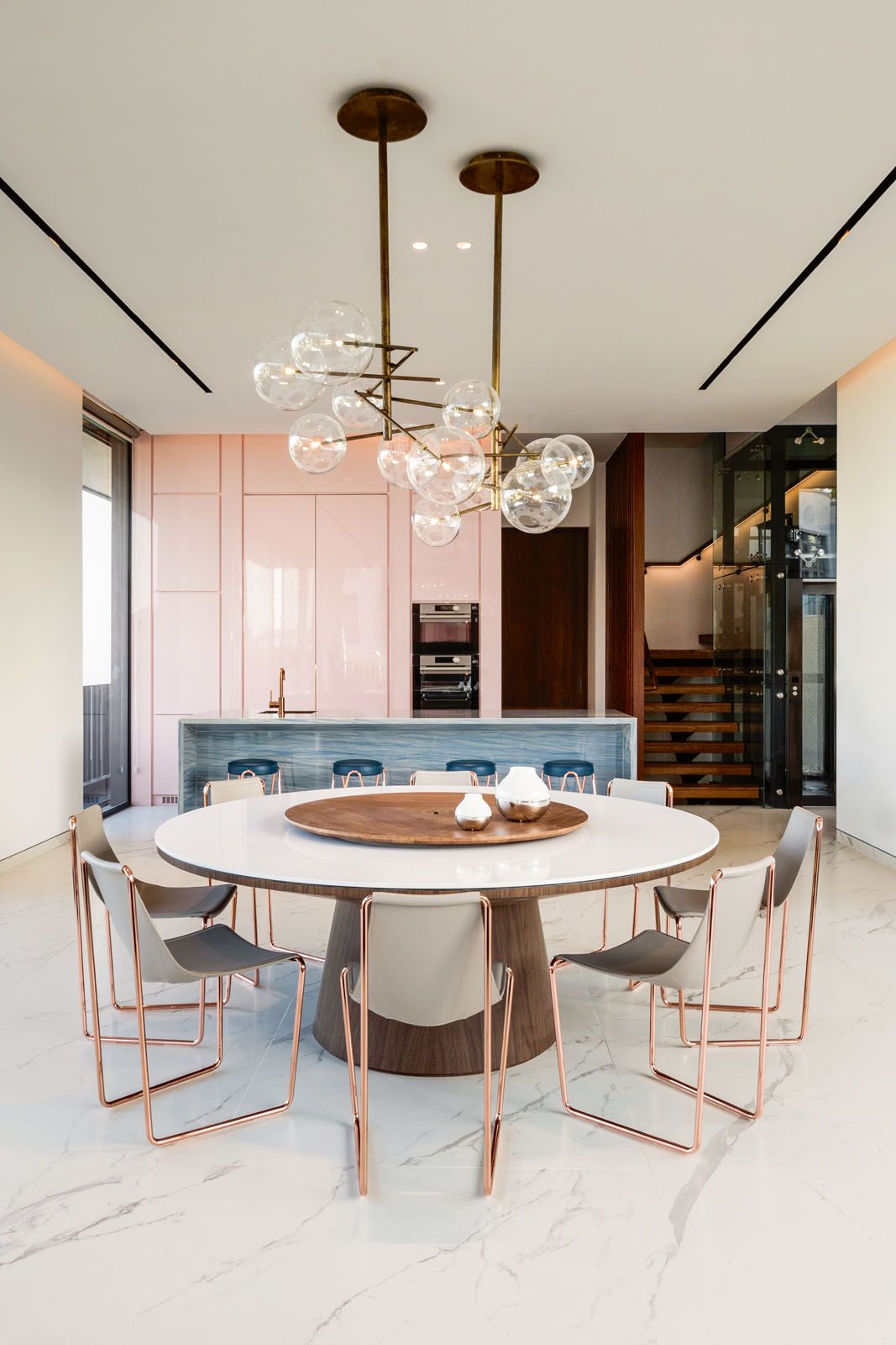 The 3.5m-long island in the dry kitchen features large-format tiles in blue azul that had to be hoisted up to the second floor