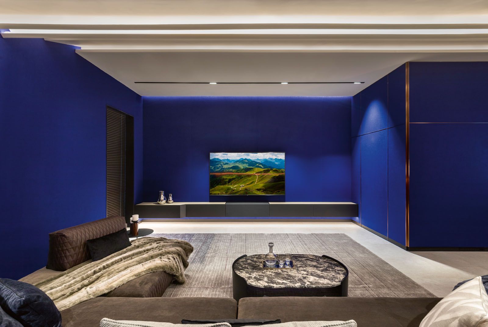The basement den is crafted as a perfect acoustic environment for movie viewing and video games