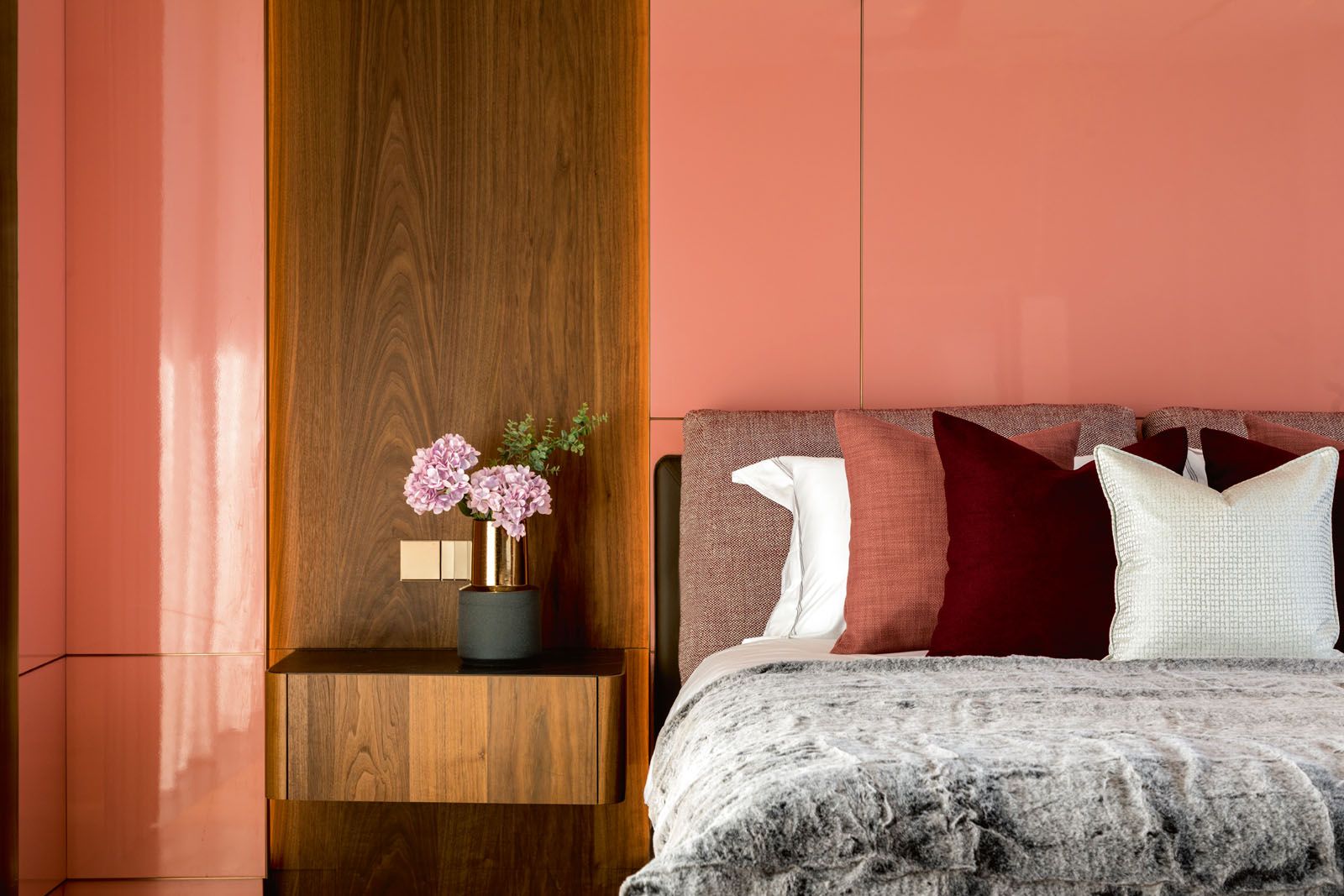 The sons’ bedrooms are similarly decked in light wood and stone to create a calming environment