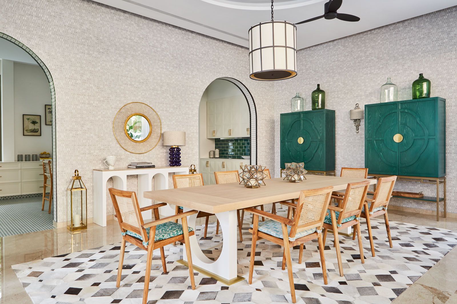 Geometric shapes found on the furniture pieces echo the architectural elements in the dining room