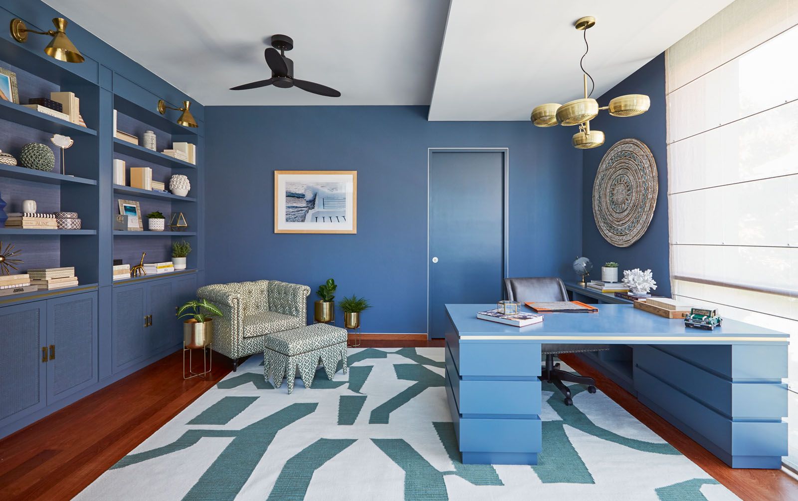 The blue palette makes the husband’s study a serene space for work and contemplation
