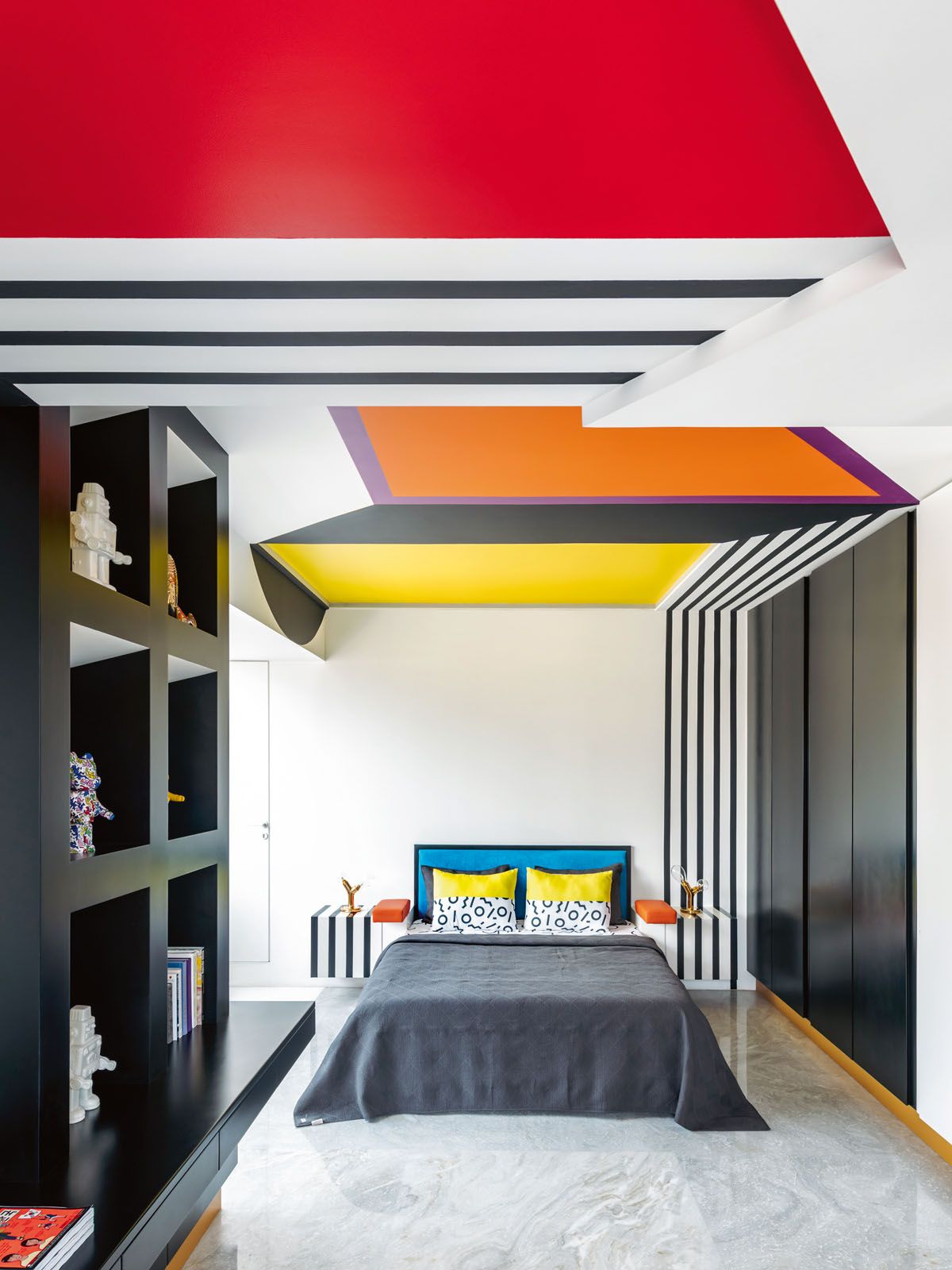 The Memphis influence is palpable throughout the home and is conveyed through the use of colour, geometric forms and pop art