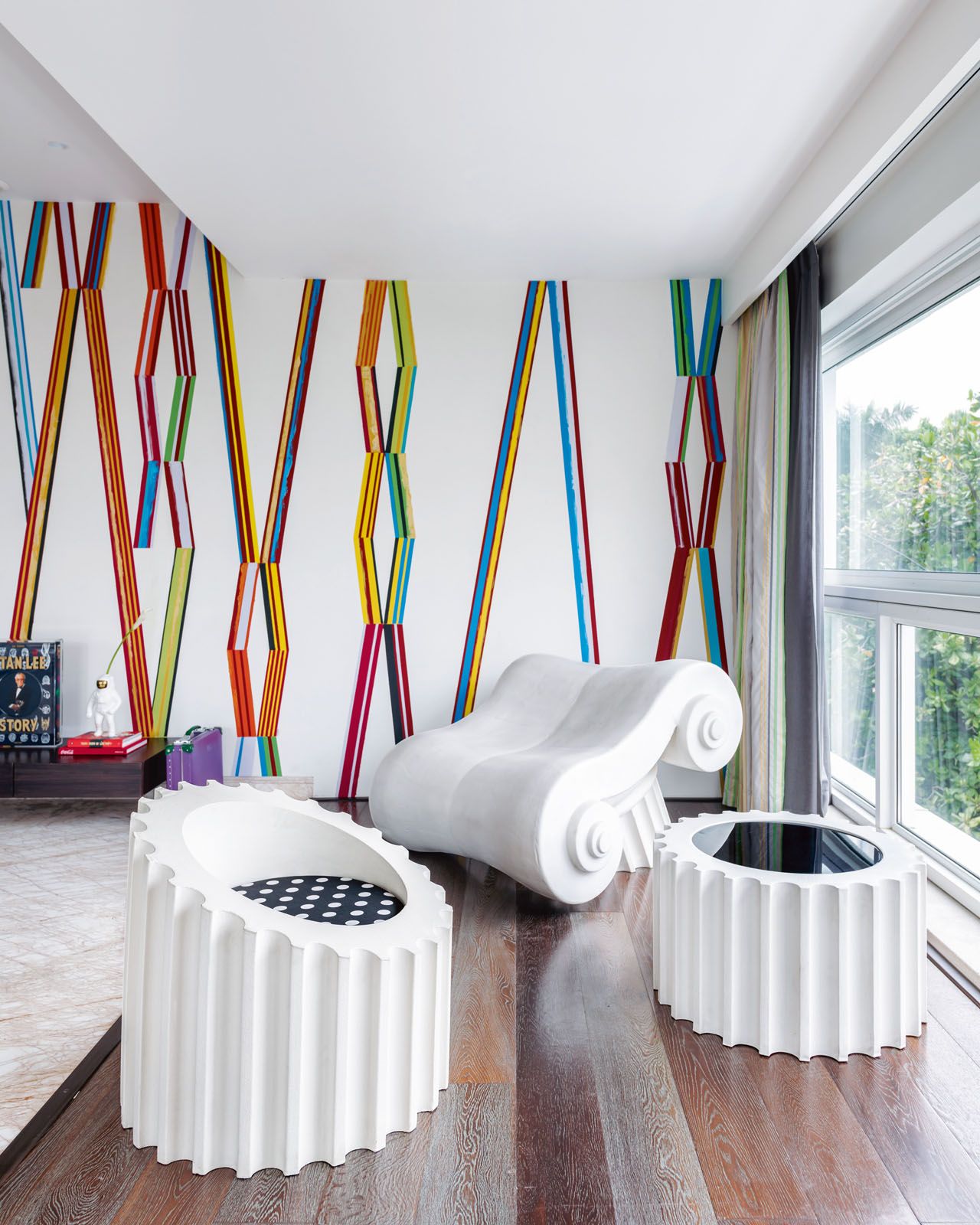 The Capitello chaise longue and Attica stools from Gufram put a surreal spin on its architectural influence