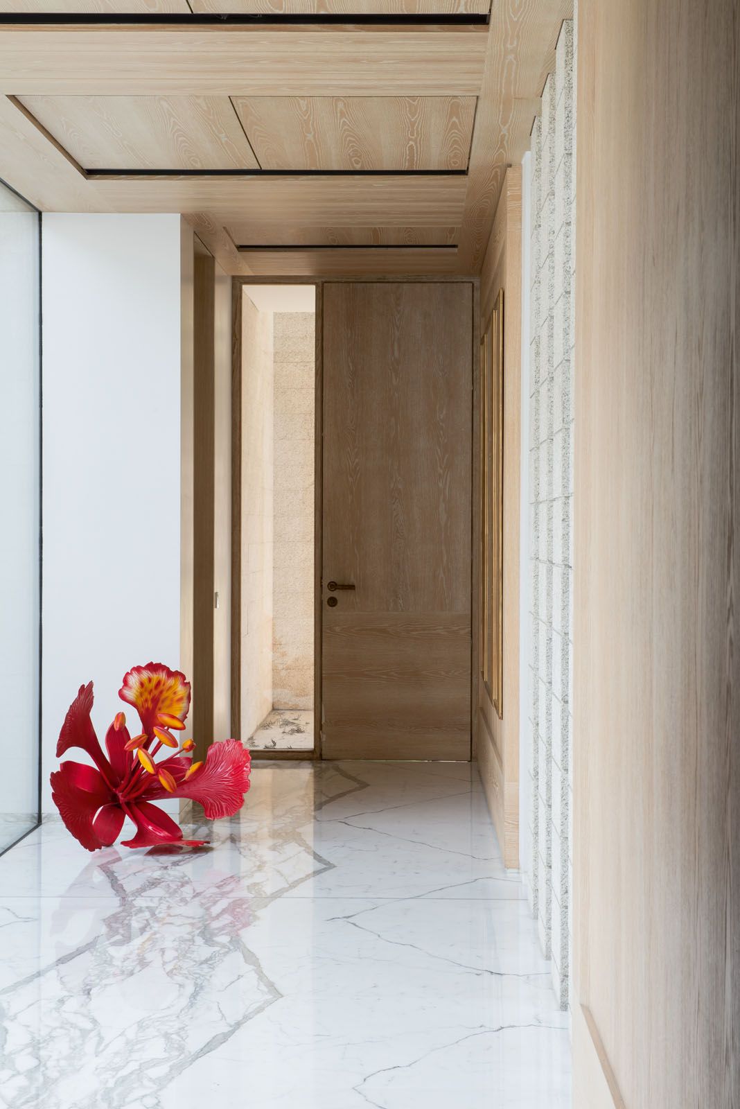 The family’s beautiful art collection adds visual interest to various areas in their home;