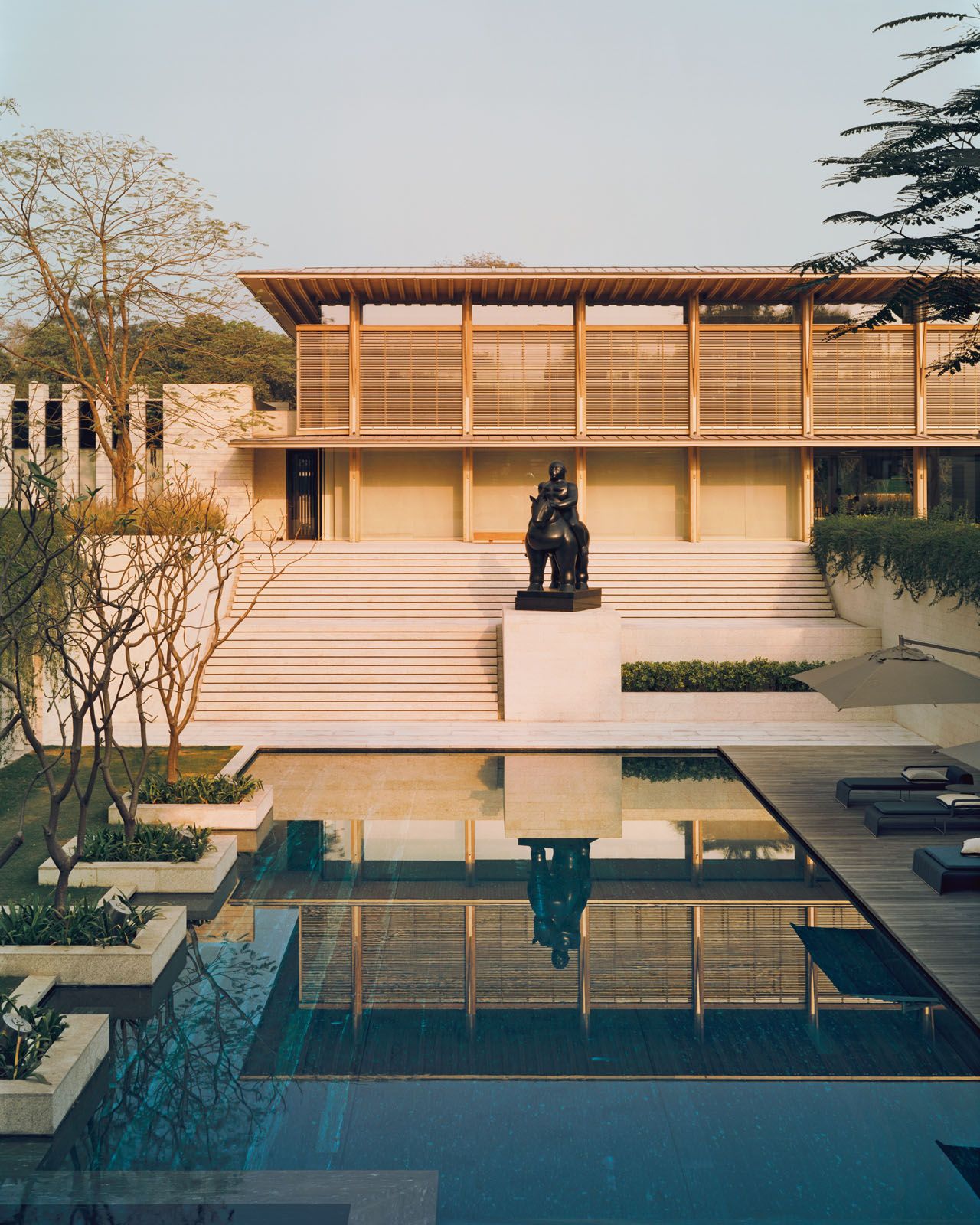 A sculpture by Fernando Botero takes pride of place in front of the pool deck