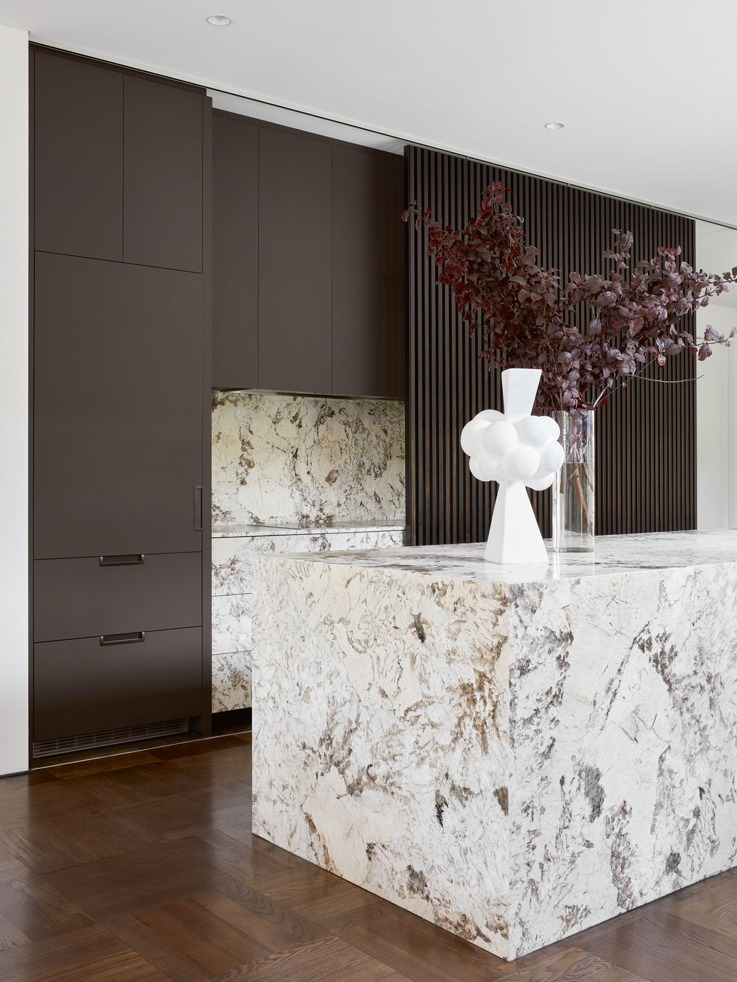 The modern kitchen is an understated balance of form and colour