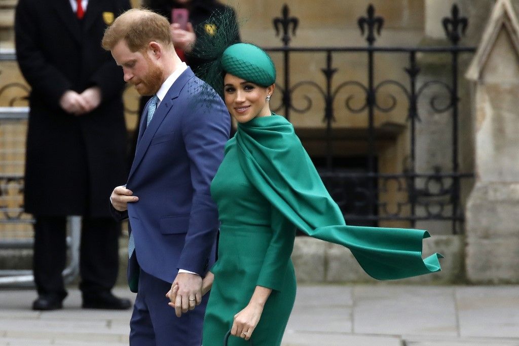 Britain's Prince Harry, Duke of Sussex, (L) and Meghan, Duchess of Sussex arrive to attend the annual Commonwealth Service at Westminster Abbey in London on March 09, 2020. - Britain's Queen Elizabeth II has been the Head of the Commonwealth throughout her reign. Organised by the Royal Commonwealth Society, the Service is the largest annual inter-faith gathering in the United Kingdom. (Photo by Tolga AKMEN / AFP)