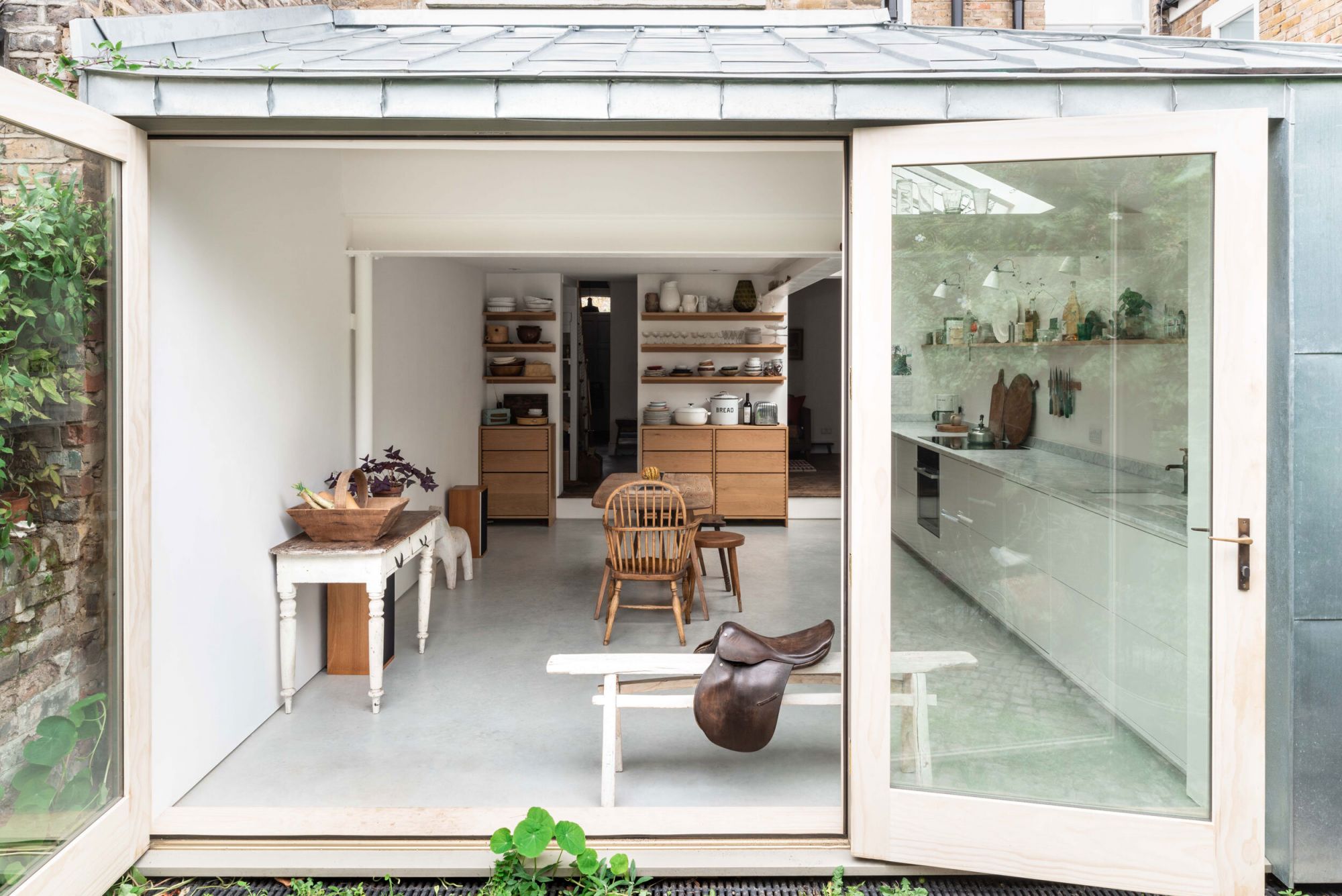 The shelves form a cohesive, linear look throughout the kitchen (Image: FRENCH+TYE)