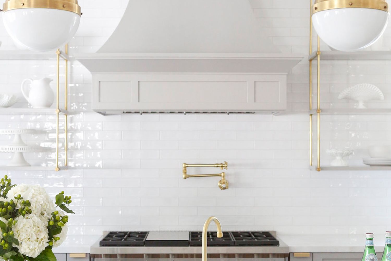 Designed by Sharon Taftian, the dual French bistro shelves enhances the glamorous look of the kitchen (Image: Sharon Taftian)