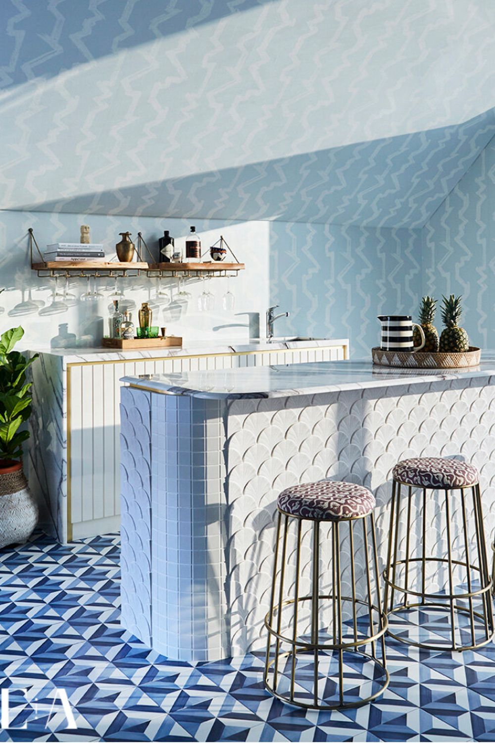 Beautifully designed by E&A Interiors, this fun kitchen features the prominent use of blue (Image: E&A Interiors)