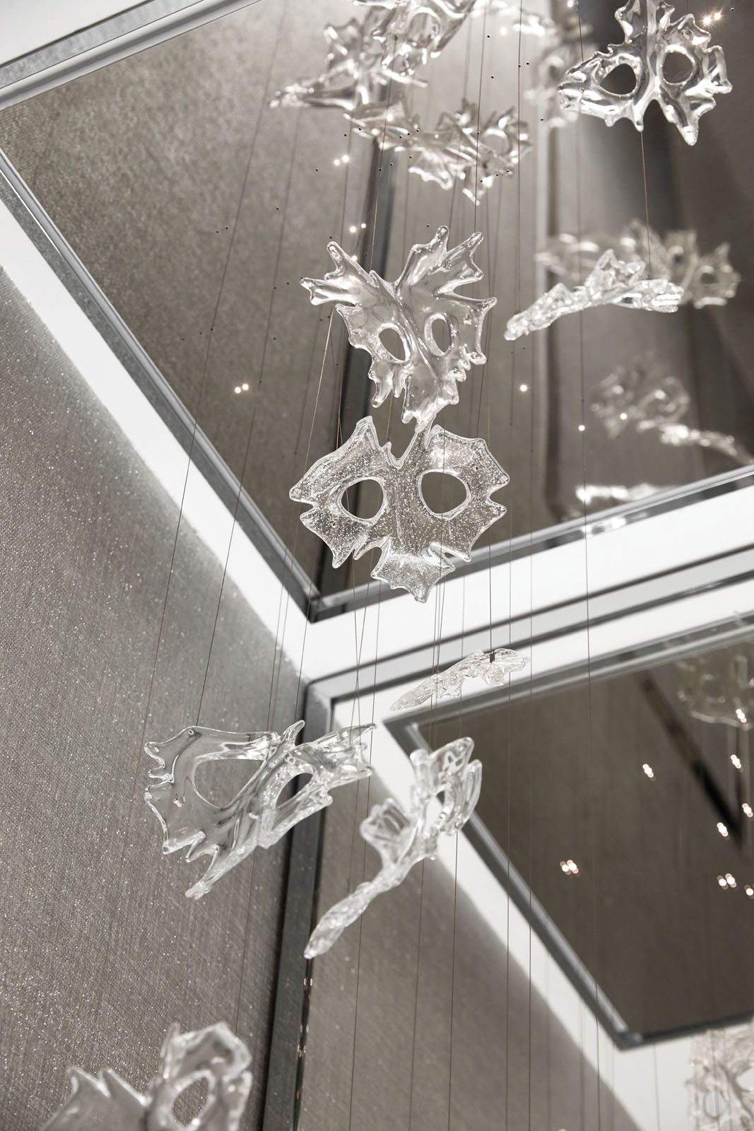 A close-up of the Swarovski chandelier custom-made for the powder room