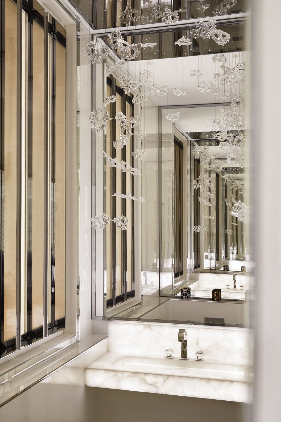 Full of elegance and sophistication, this luxurious powder room is thoughtfully decorated by Stéphanie Coutas