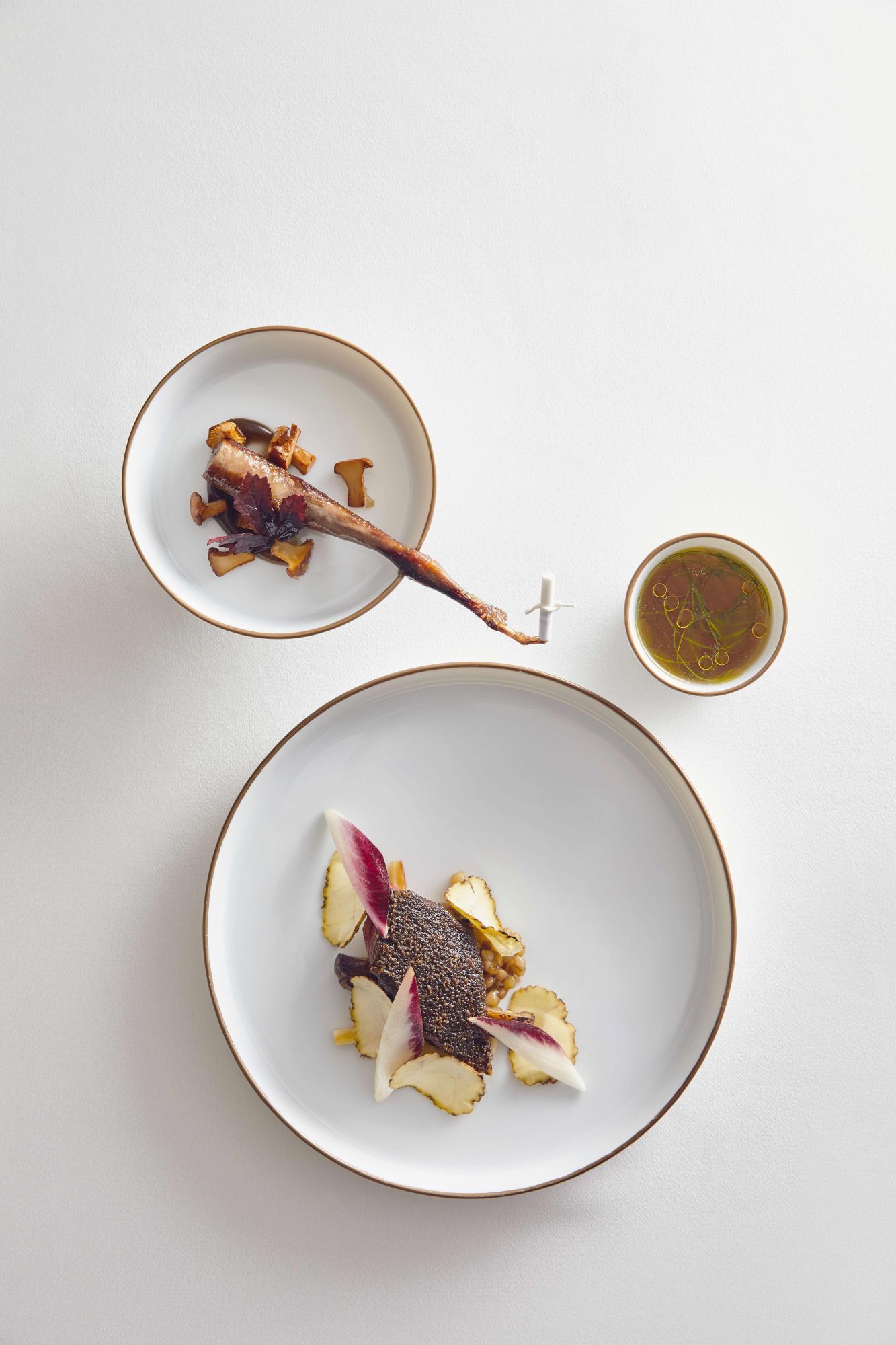 Odette's signature serving of pigeon from Brittany, France that chef Royer seasons with Kampot pepper