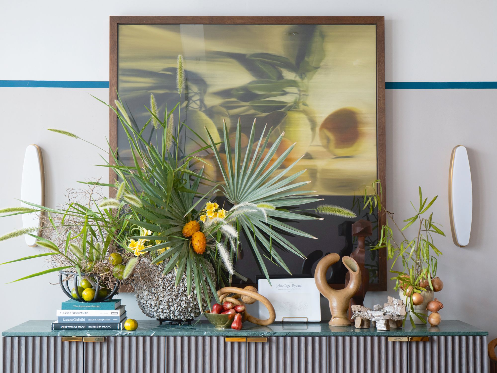 This Humid House brings this console to life with a verdant array of plants