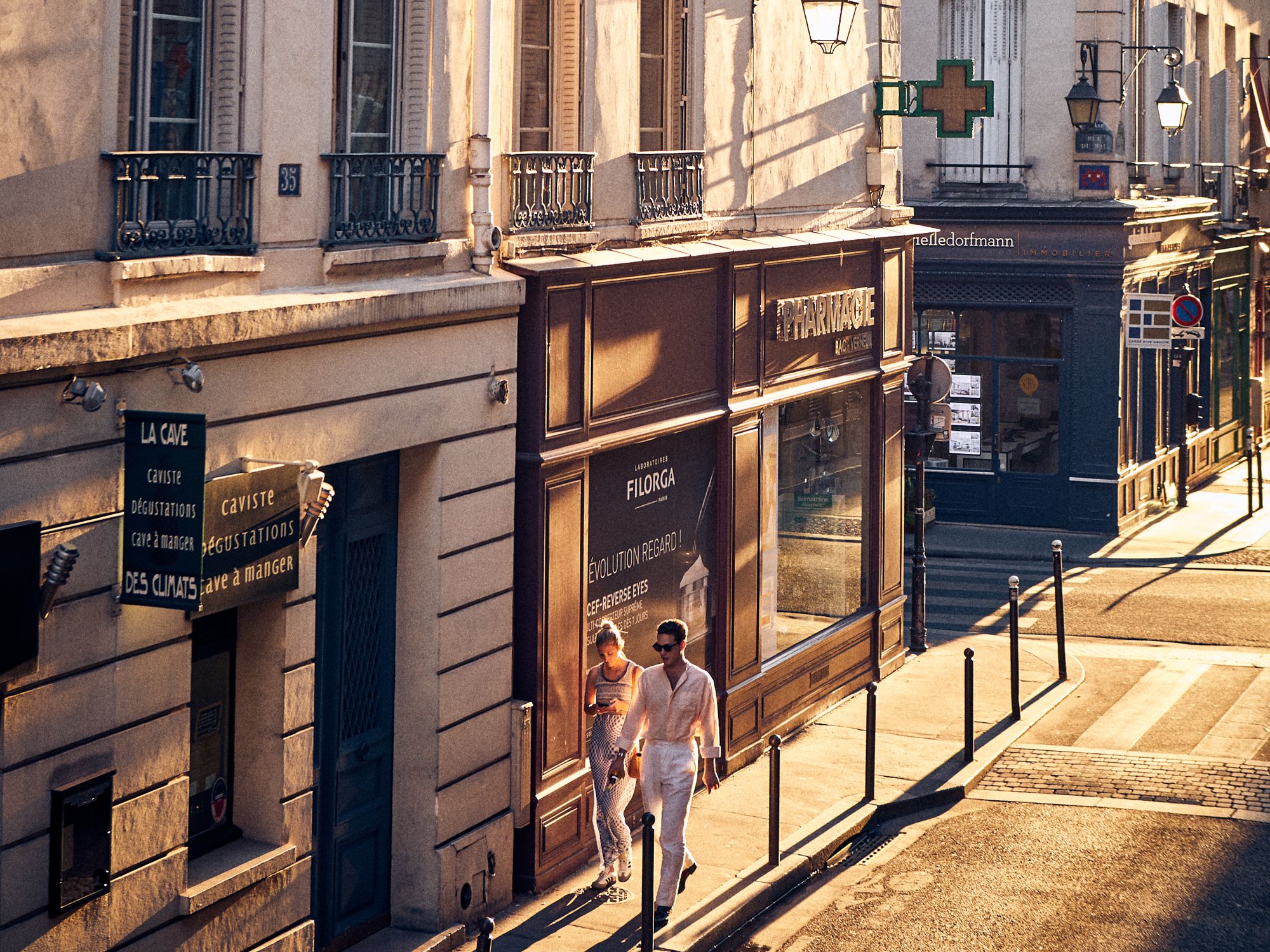 The streets of Paris cast in a warm golden glow (Image: Oliver Pilcher, courtesy of Assouline)