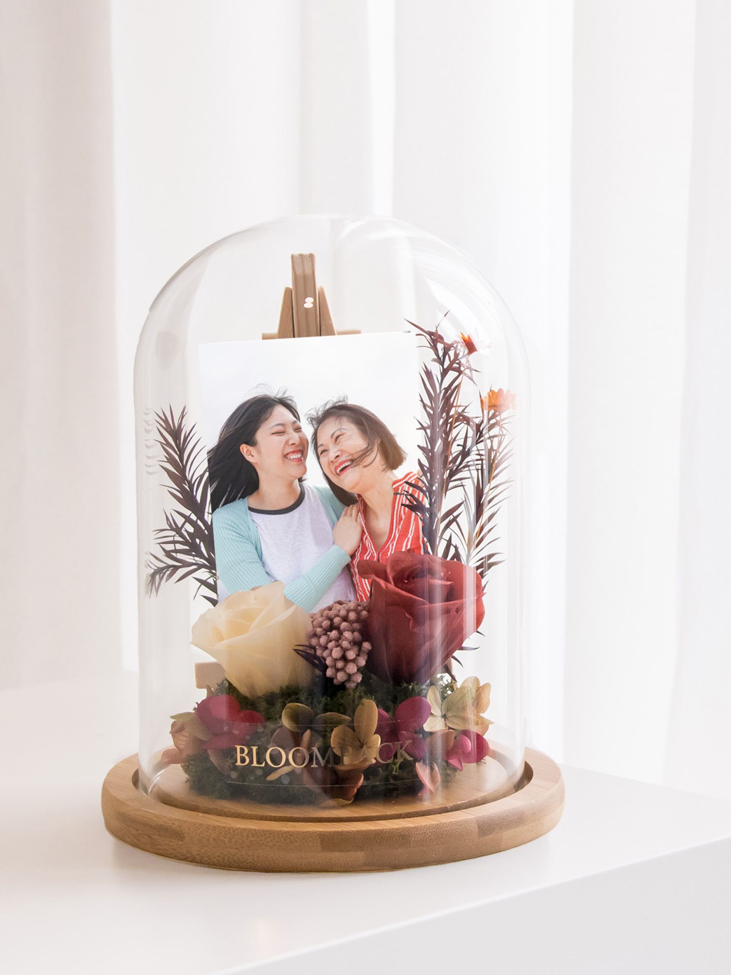 BloomBack's Mother's Day preserved flower collection that features a photo inside (Image: BloomBack)