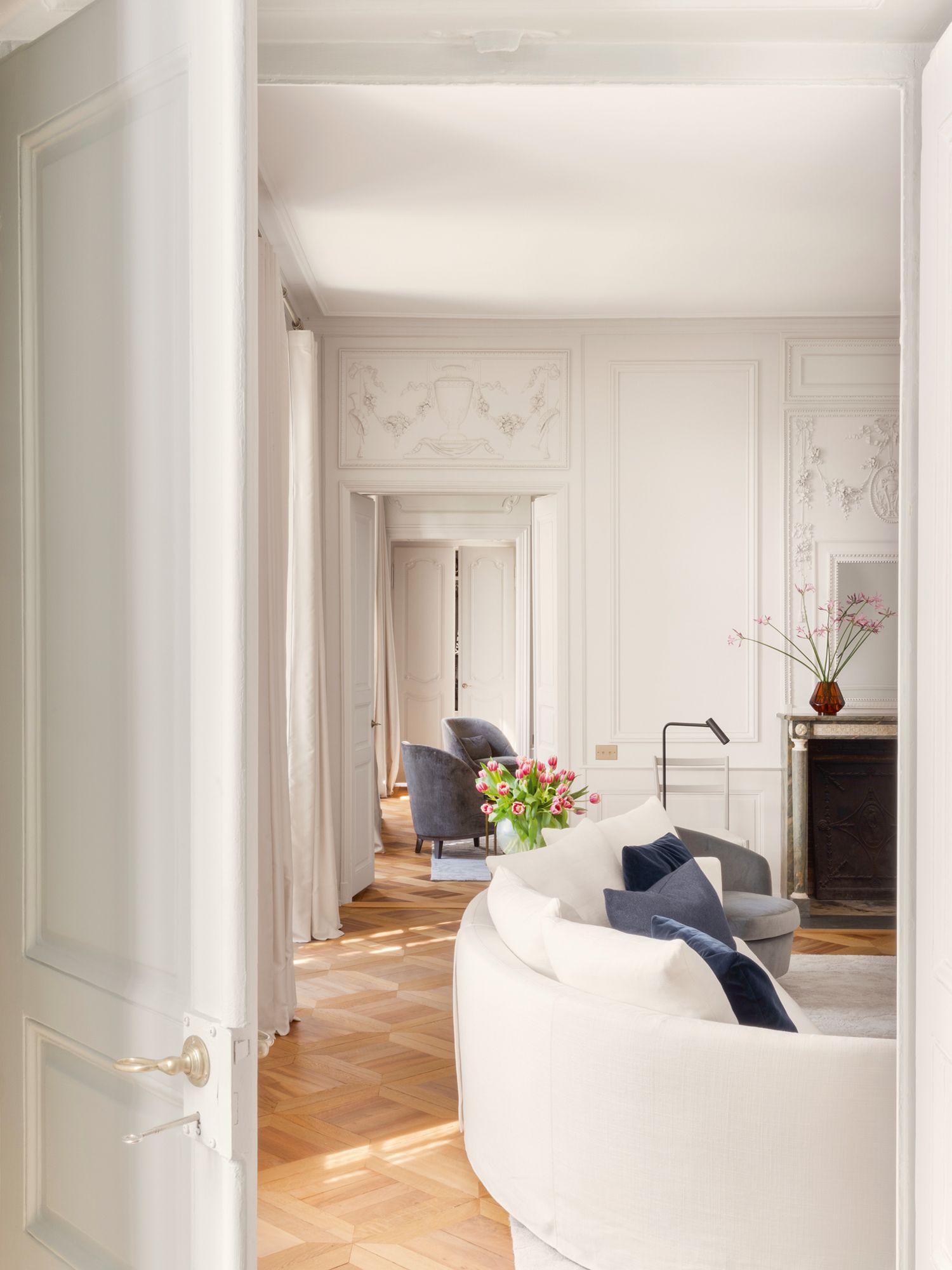 The original flooring and ornate mouldings were restored during the renovation