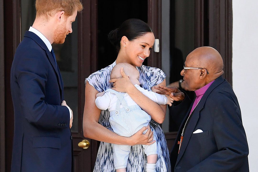 Prince Harry and Meghan holding Archie Mountbatten-Windsor as they meet Archbishop Desmond Tutu and his daughter Thandeka Tutu-Gxashe in South Africa (Photo: Toby Melville/Pool/Samir Hussein/WireImage)