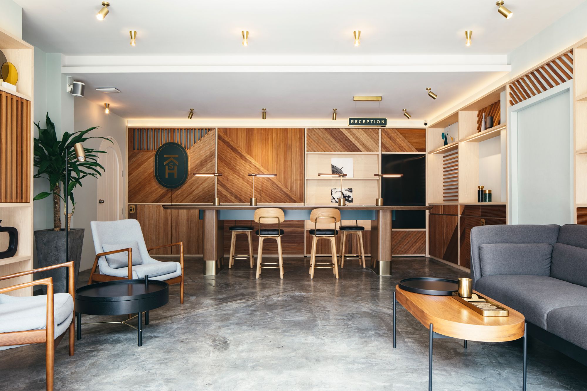 The modern interior of the shophouse is housed within a historic exterior shell