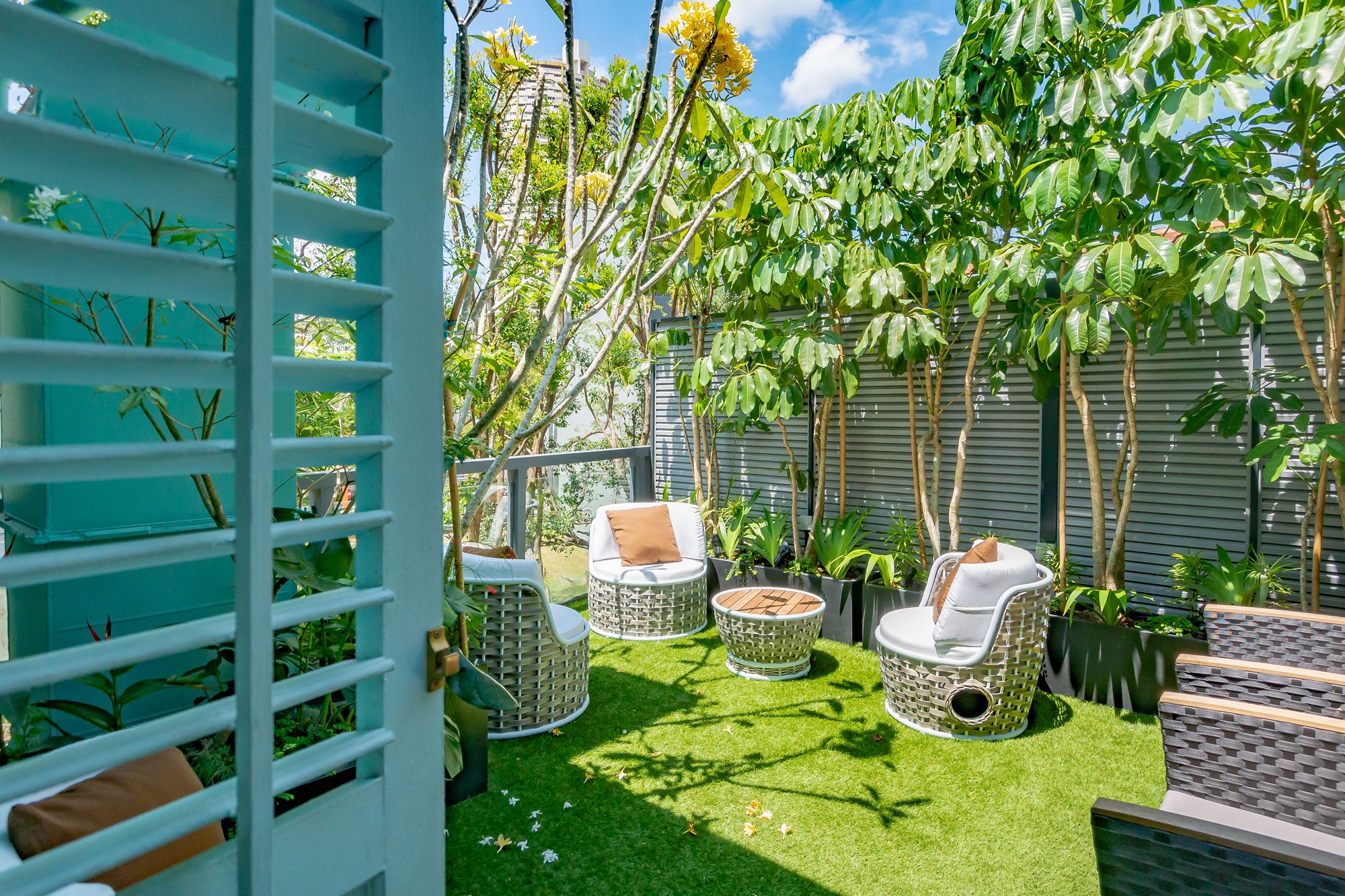 The common terrace located in the boutique hotel allows one to soak in the sunshine and lush greenscape