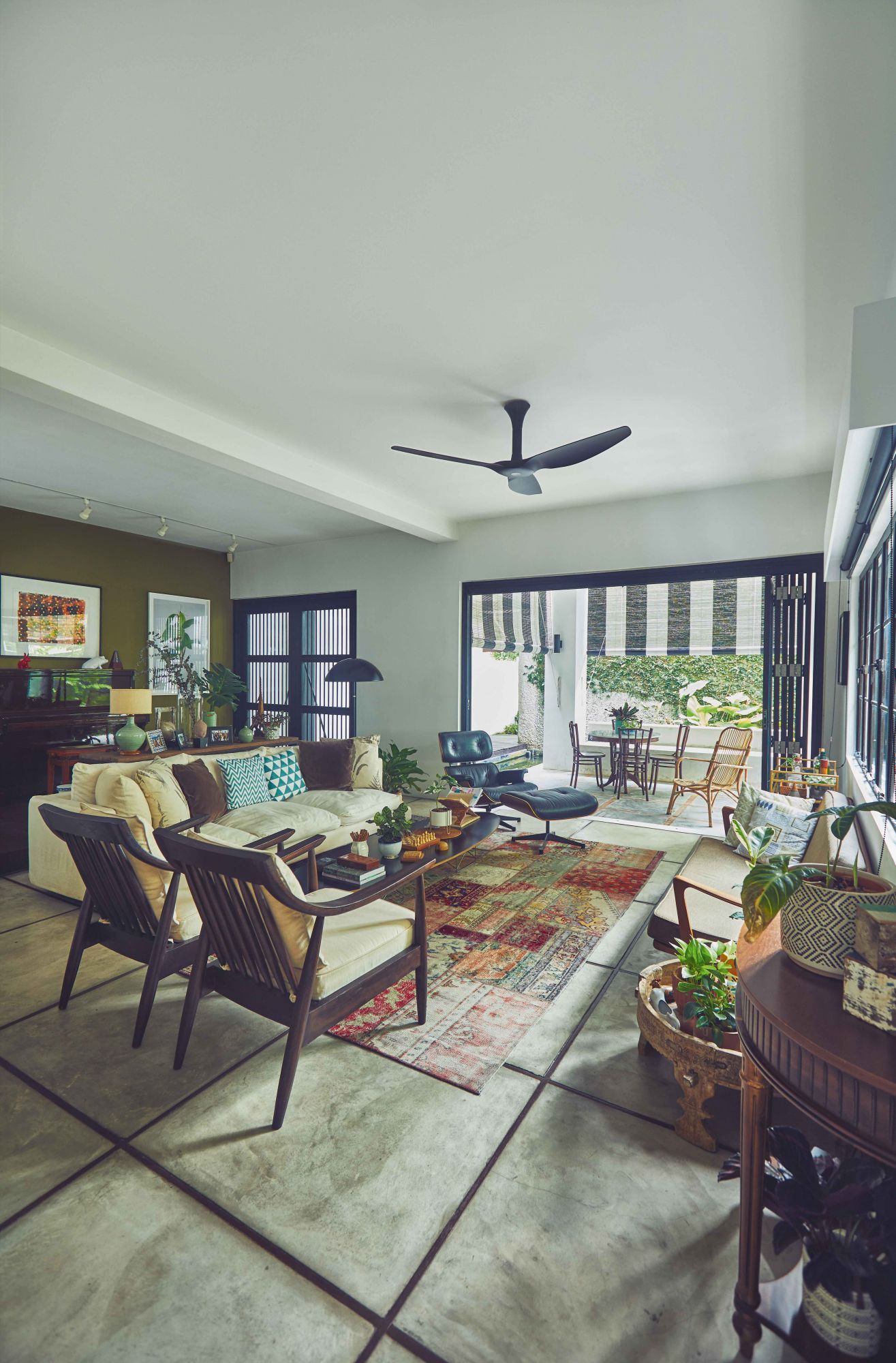 Actress Janice Koh's living room space is filled with mid-century modern pieces Photo: Darren Gabriel Low