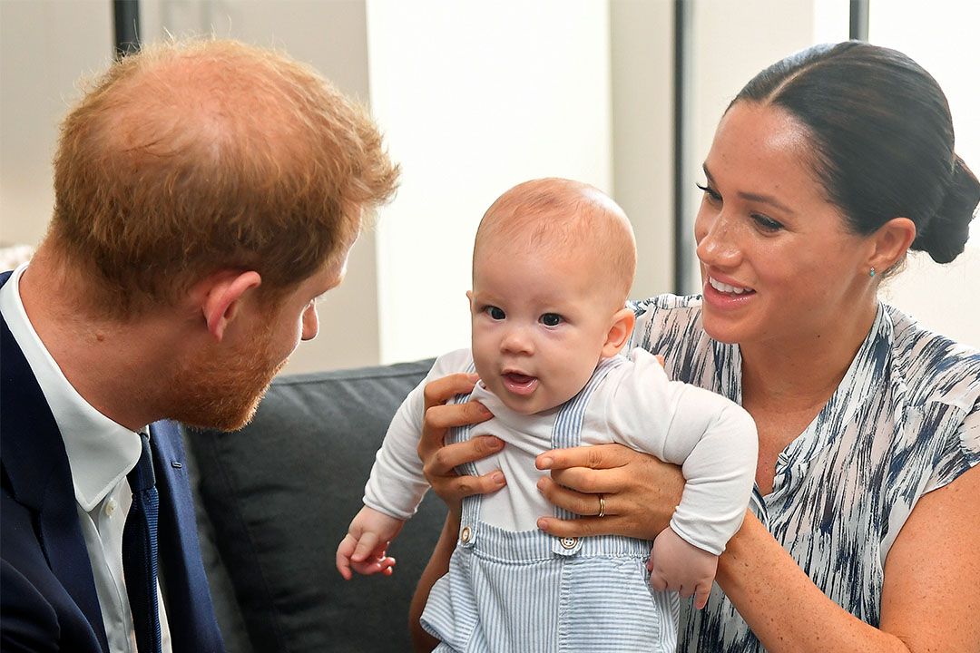 Prince Harry and Meghan holding Archie as they meet Archbishop Desmond Tutu. REUTERS/Toby Melville/Pool. Photo: Toby Melville/PA Images via Getty Images