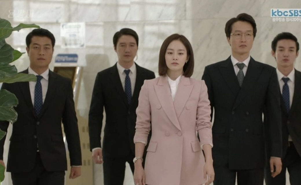Professional and stylish in a soft pink blazer. Photo: Han Cinema
