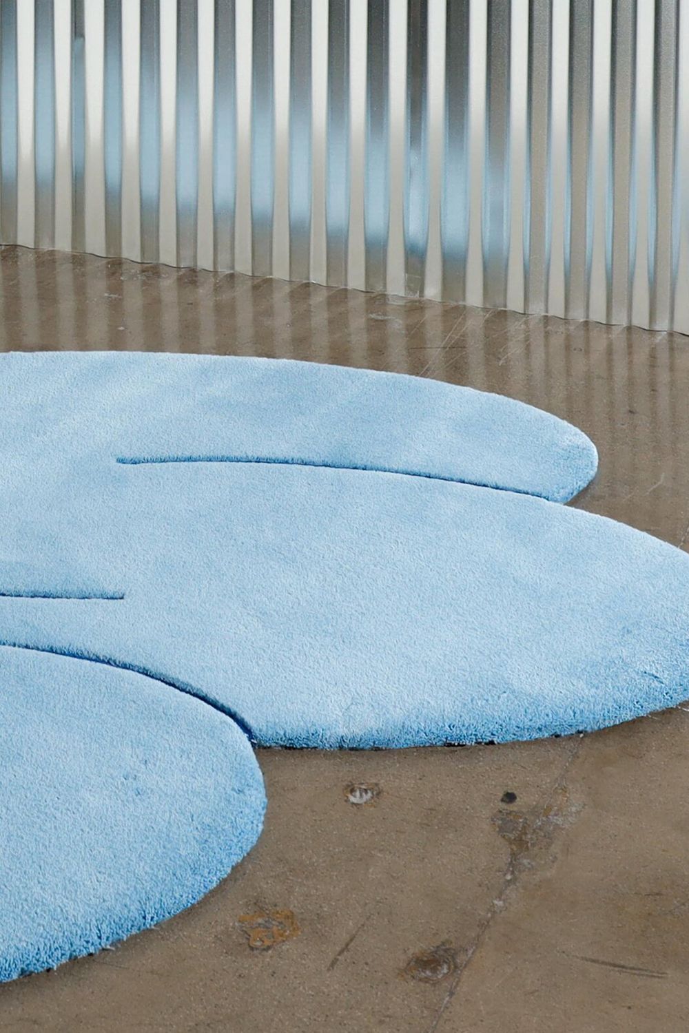 Okej Cloud Blue Squiggle rug Image: Courtesy of Okej