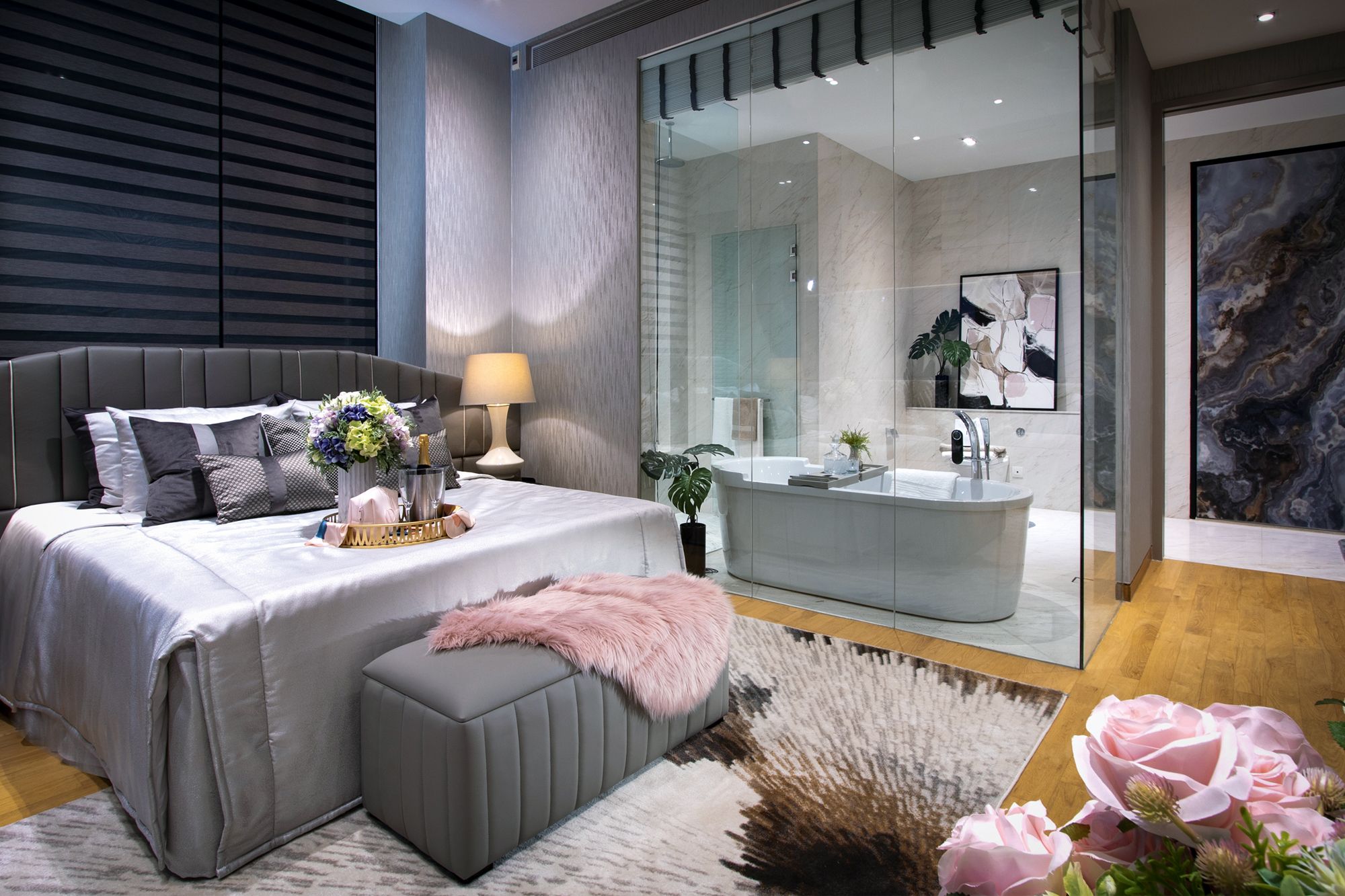 The master bedroom is designed like a hotel suite with an ensuite bathroom