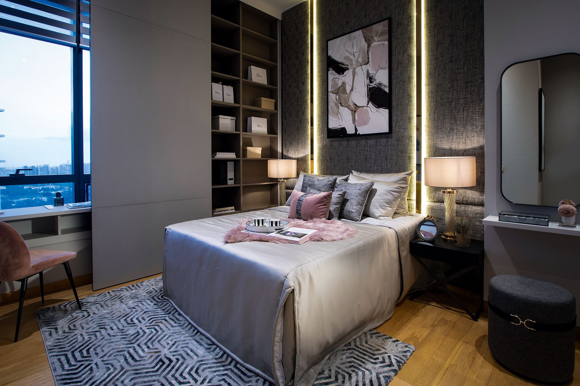 Blush pink accents bring a feminine touch to the daughter’s bedroom