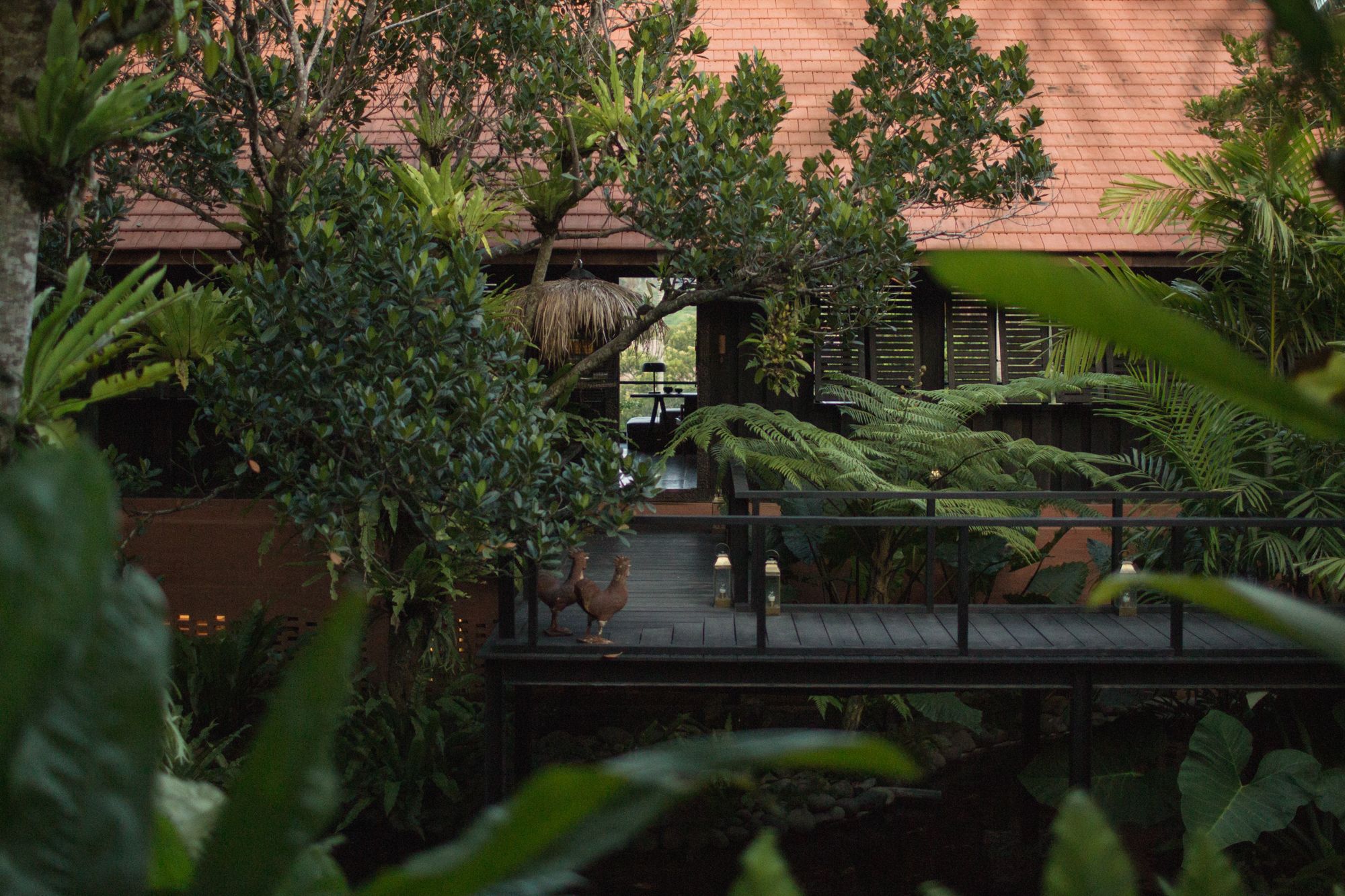 Nestled within the natural beauty of the prolific foliage, the idyllic residence is a quiet family sanctuary