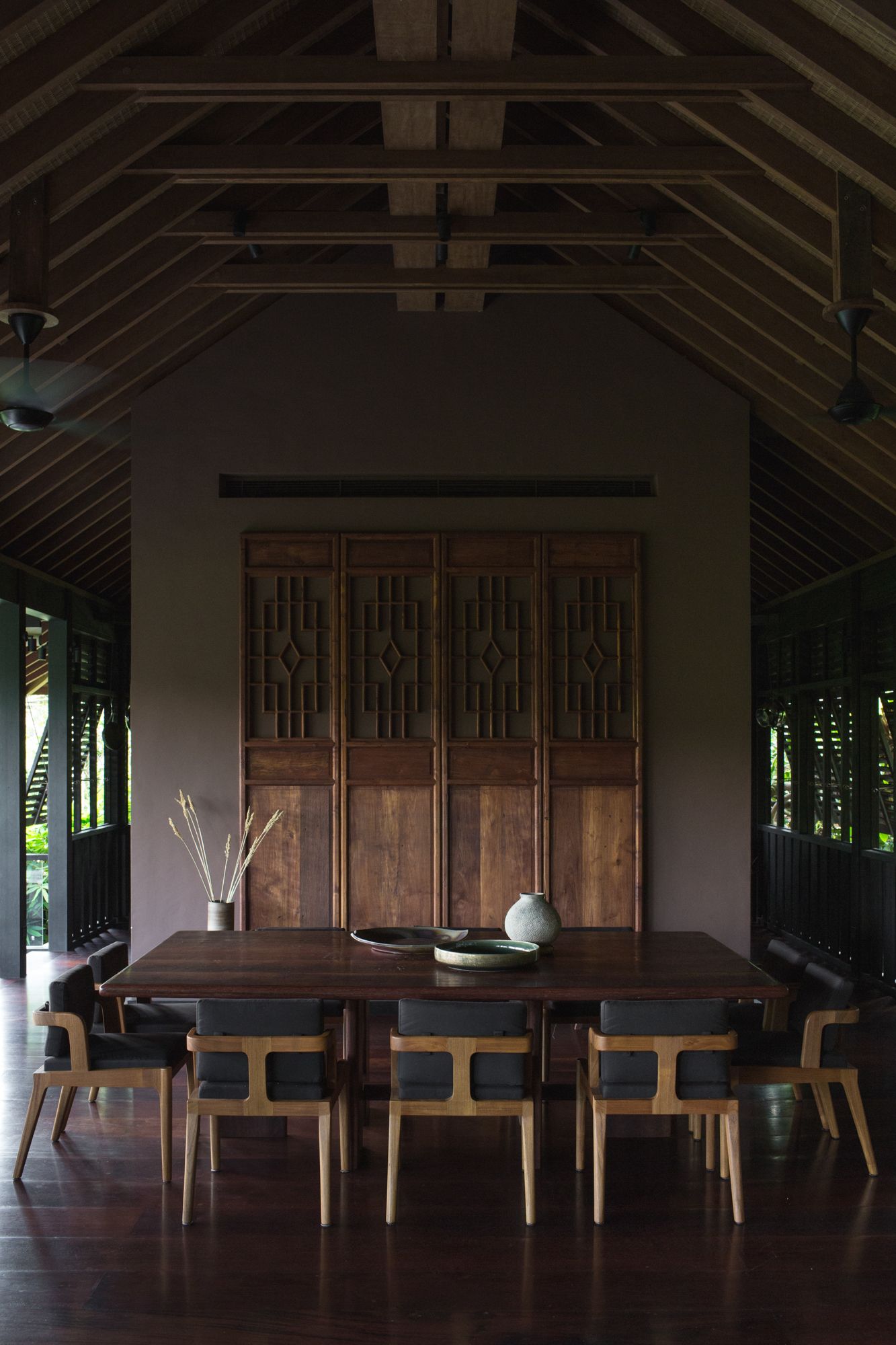 The dining area features a bespoke dining table by Studio Jencquel