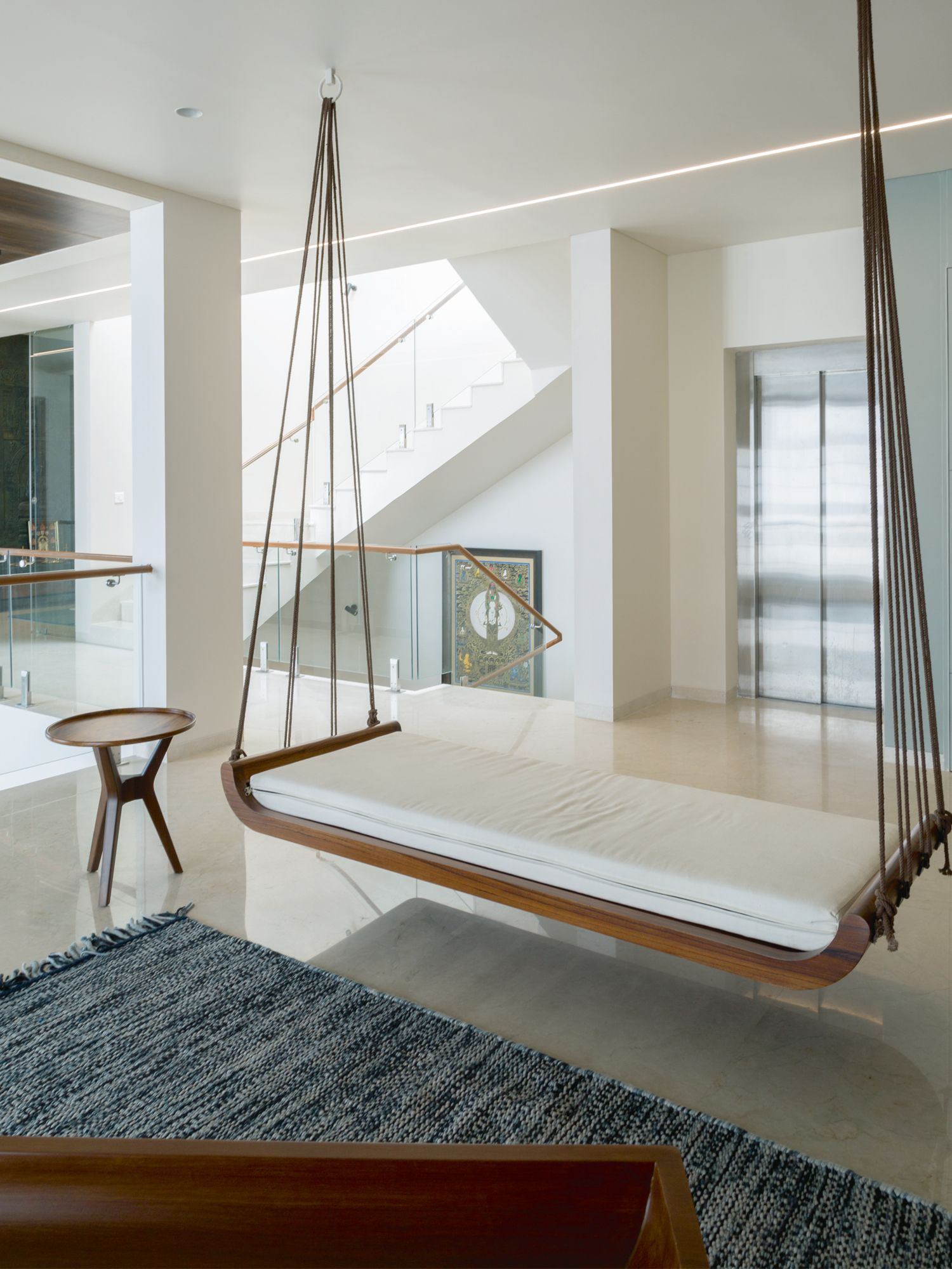Installing a swing in your house creates a playful ambience