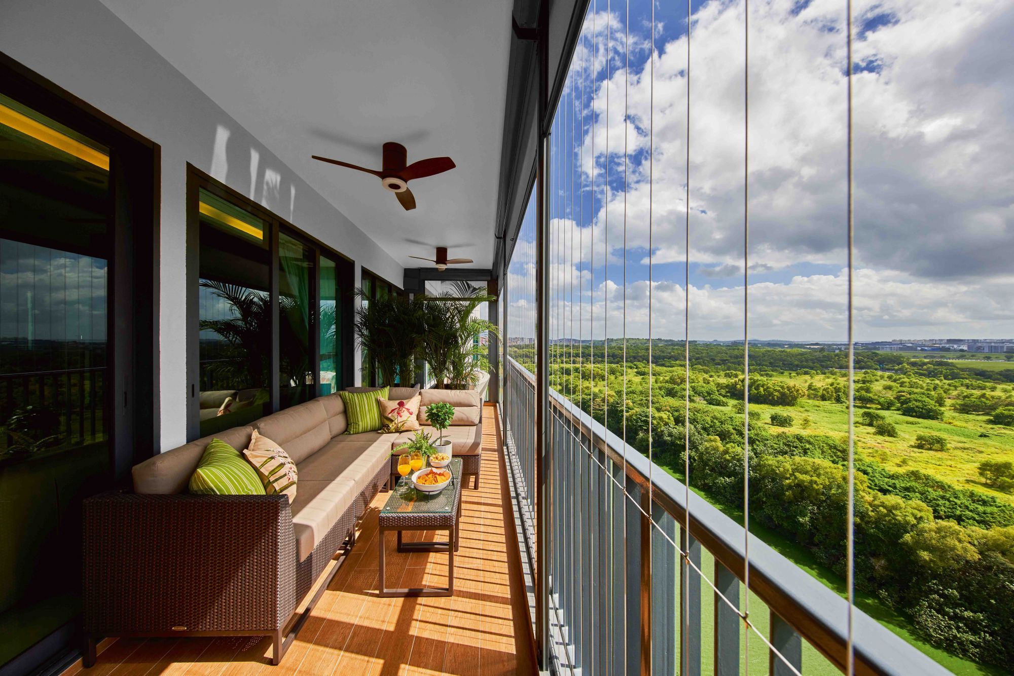Designed by Prestige Global Designs, this lengthy balcony is a cosy space for the family to hang out together Photography: Jasper Yu