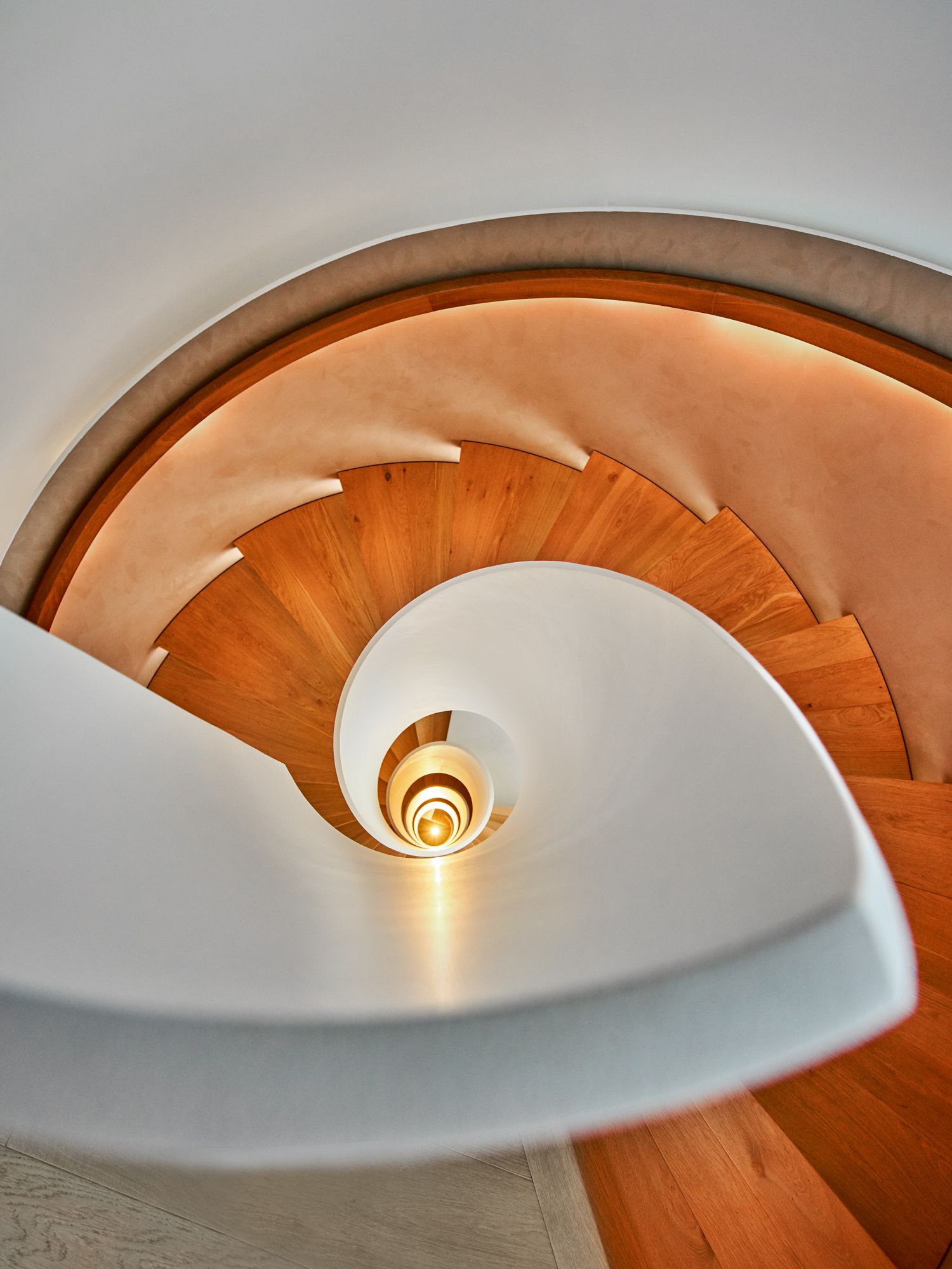 A top-down view of the spiral staircase, which is the centrepiece of the home