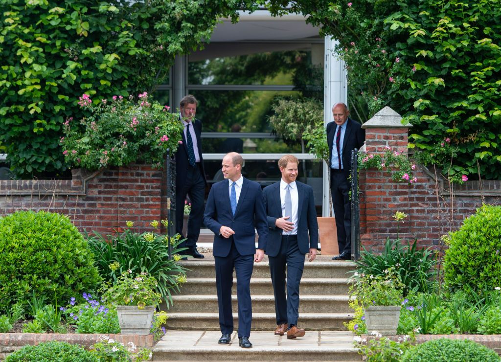 LONDON, ENGLAND - JULY 01: Prince William, Duke of Cambridge (left) and Prince Harry, Duke of Sussex arrive for the unveiling of a statue they commissioned of their mother Diana, Princess of Wales, in the Sunken Garden at Kensington Palace, on what would have been her 60th birthday on July 1, 2021 in London, England. Today would have been the 60th birthday of Princess Diana, who died in 1997. At a ceremony here today, her sons Prince William and Prince Harry, the Duke of Cambridge and the Duke of Sussex res