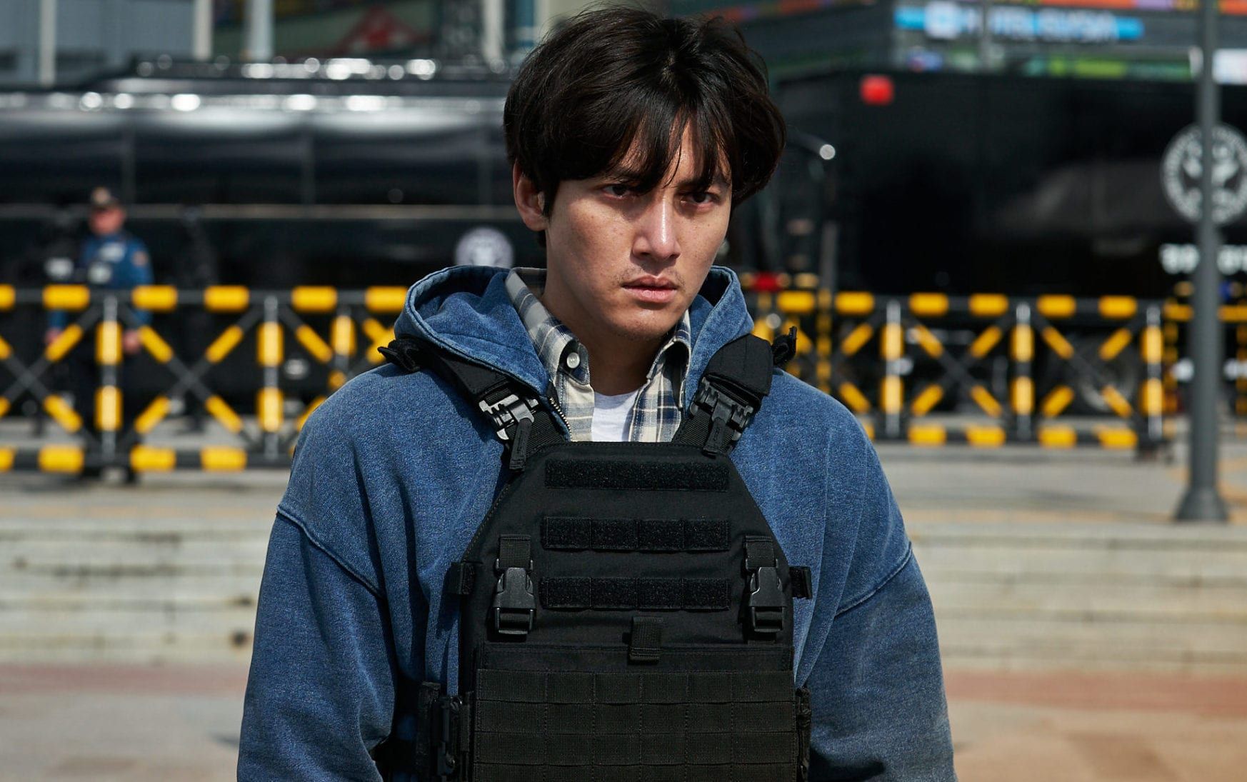Um, unkempt back alley chic, anyone? In his latest movie, Hard Hit, aka Restricted Call.