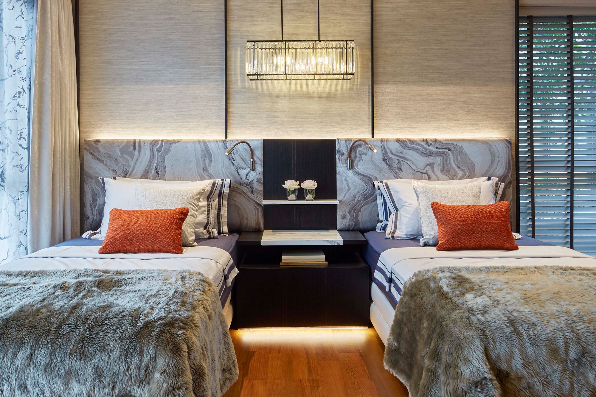 The patterned headboards add a dose of vibrance to the bedrooms without being too excessive