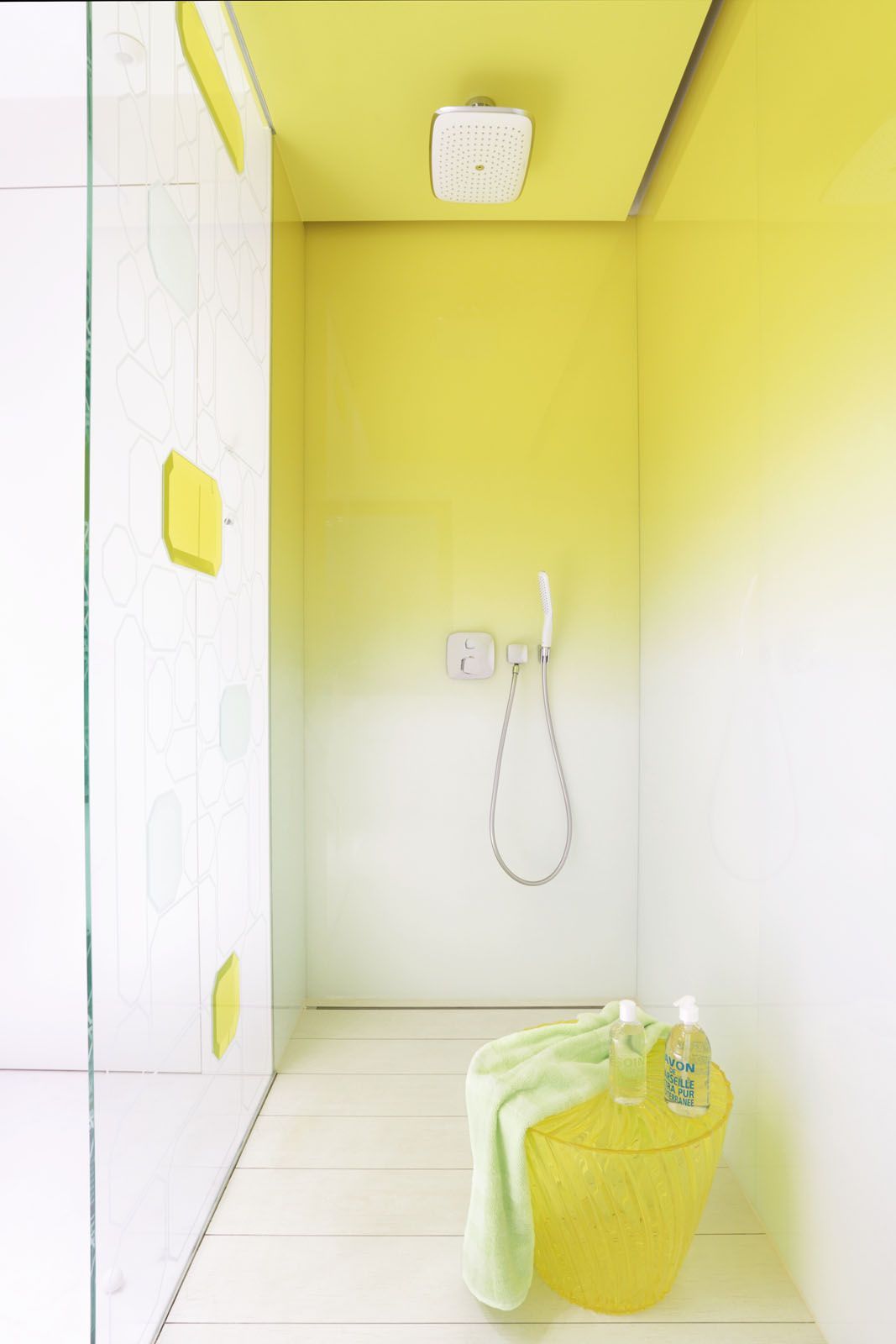This vibrant shower designed by Urbe Design Studio is a cheerful space for the homeowners to start their mornings Image: Aneta Tryczynska / Photofoyer