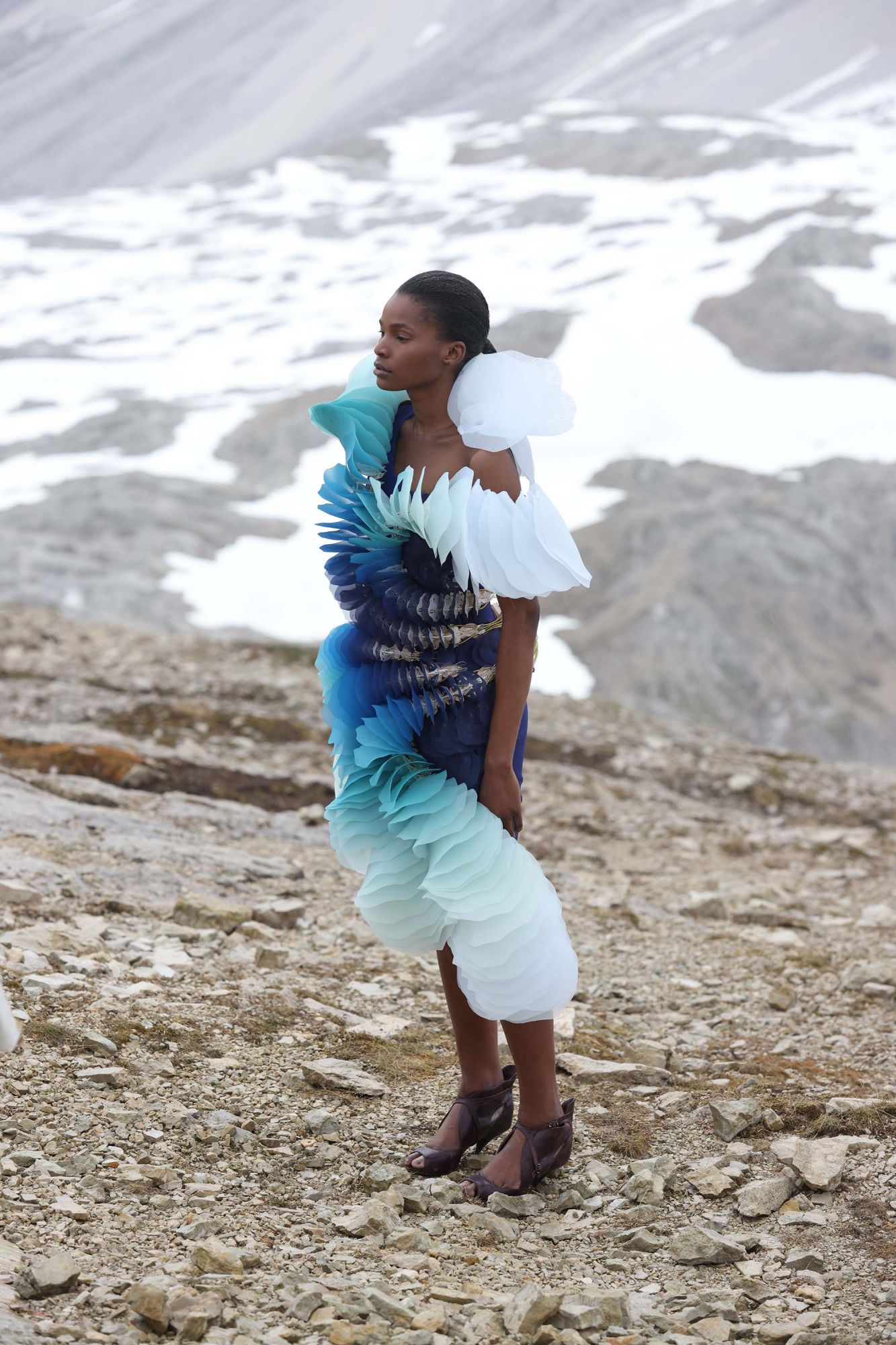 UNSPECIFIED, ITALY - JUNE 25: DOLOMITES, ITALY â JUNE 25: In this image released on July 5th, a model poses during Iris Van Herpen Haute Couture Fall/Winter 2021/2022 collection shooting as part of the Paris Fashion Week on June 25, 2021 in the Dolomites, Italy. (Photo by Vittorio Zunino Celotto/Getty Images) (Photo by Vittorio Zunino Celotto/Getty Images)
