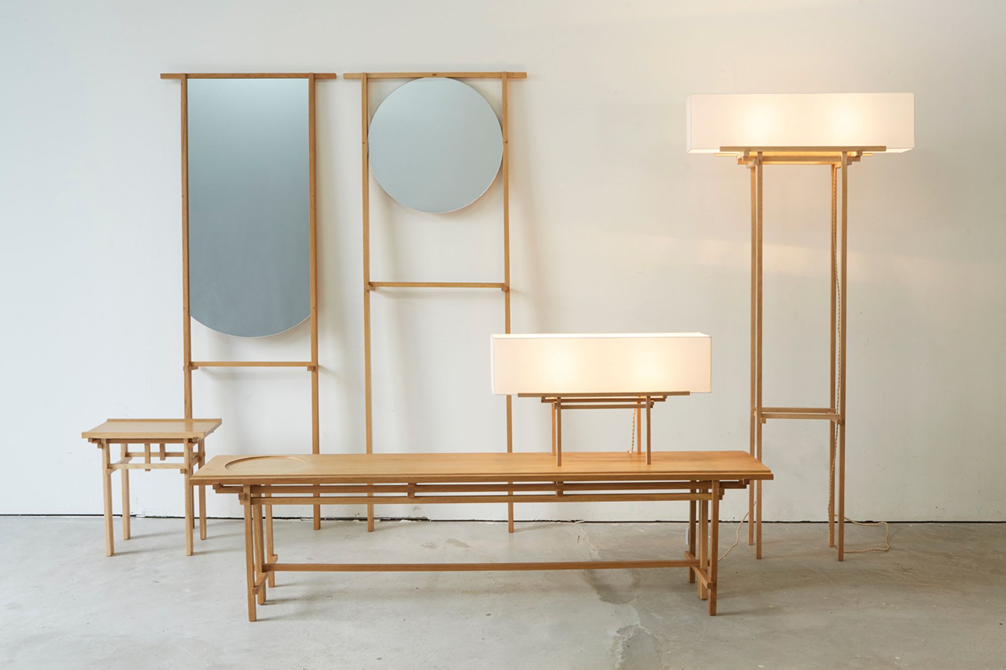Born out of Tan's interest in wood joinery, the Dougong collection encompasses lighting pieces, a bench, a side table, and standing mirrors