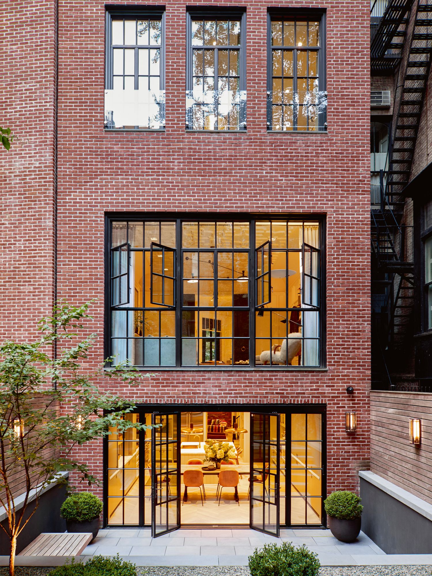 A view of the townhouse’s red-bricked facade